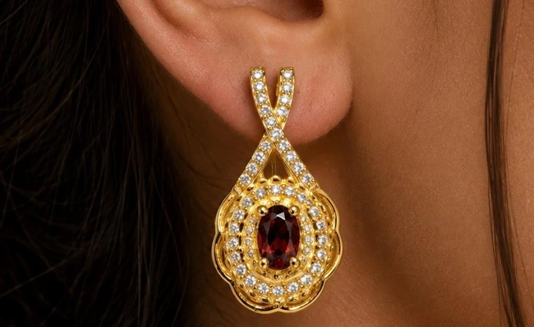 $400, silver(4.98g), garnet (0.3ct) earring, reta