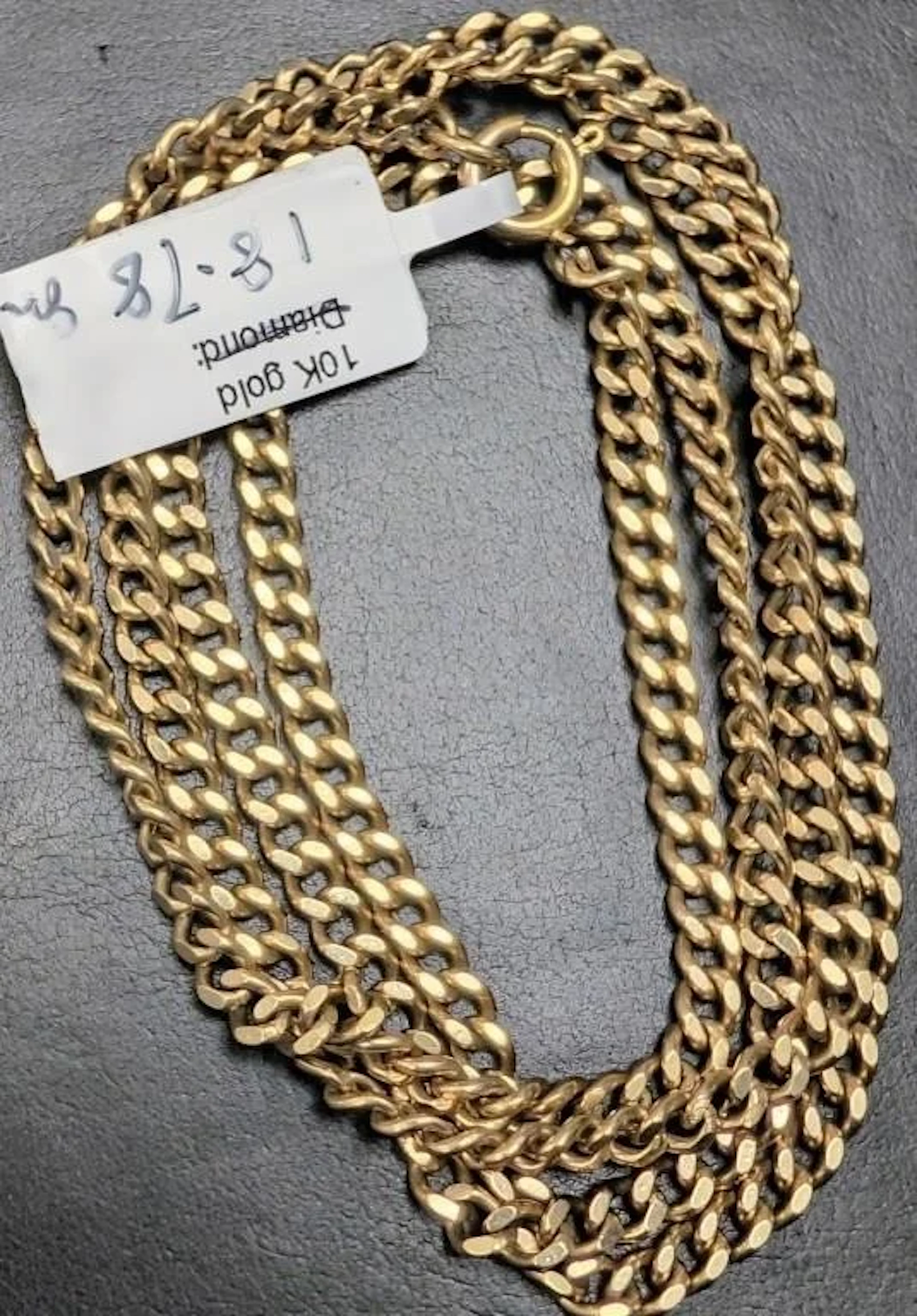 $13000, 10k(18.78g), curb chain 26", retail valu