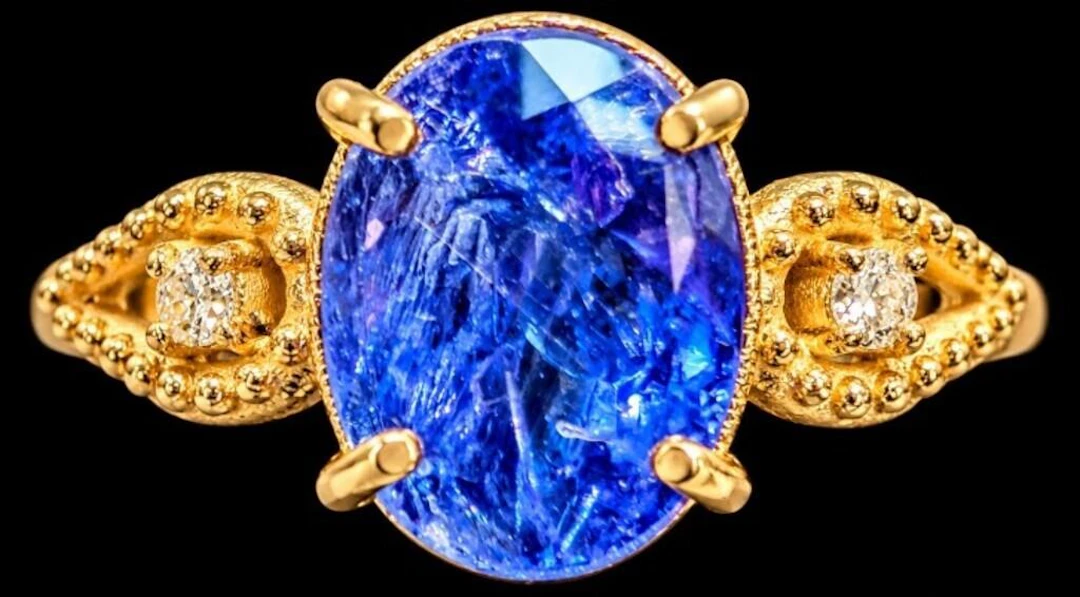 $4800, 10k(2.3g), tanzanite (3.3ct)ring, size 7, r