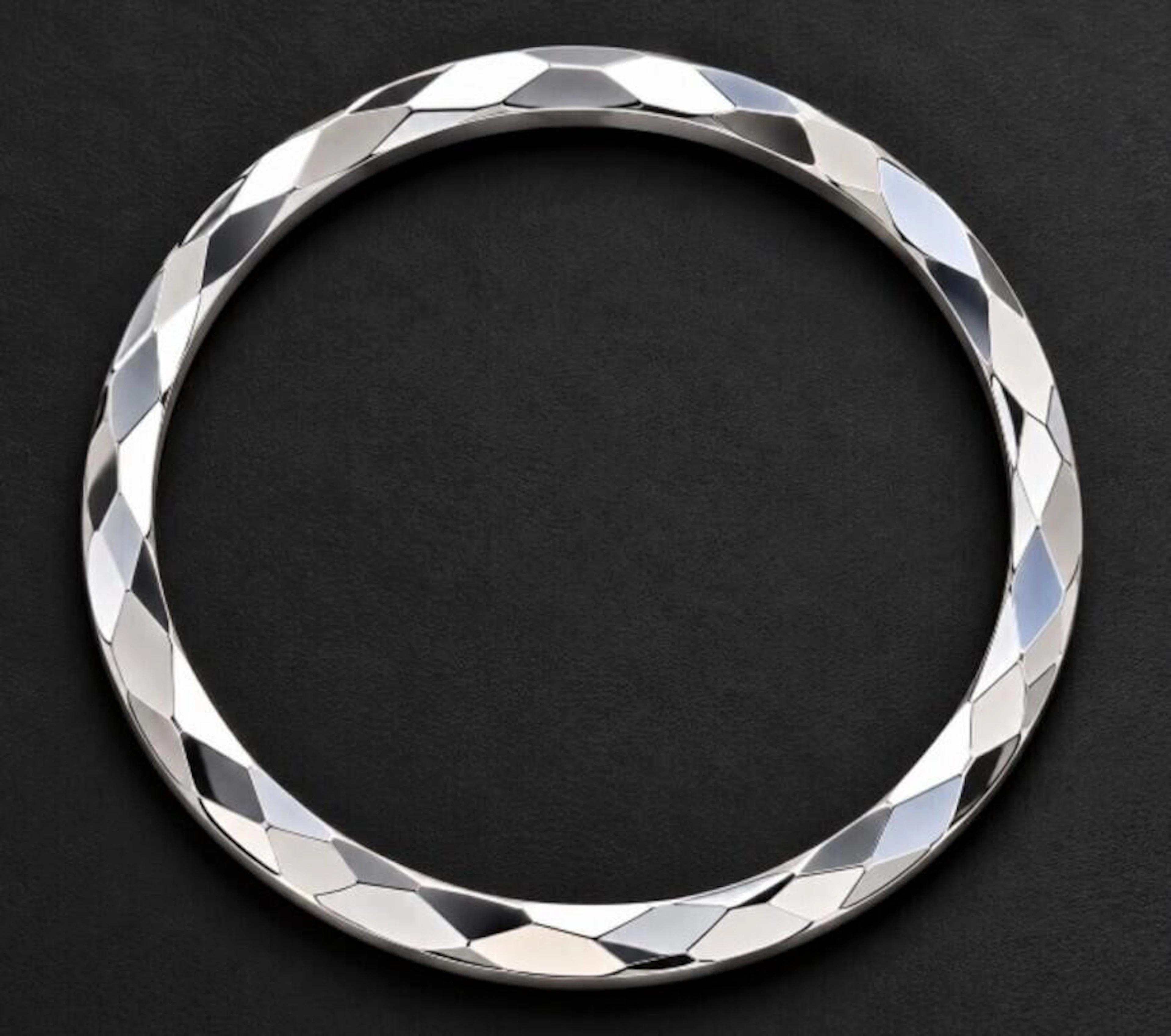 $380, silver (12.7g), bangle, retail value $380