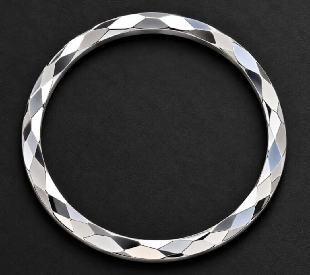 $380, silver (12.7g), bangle, retail value $380