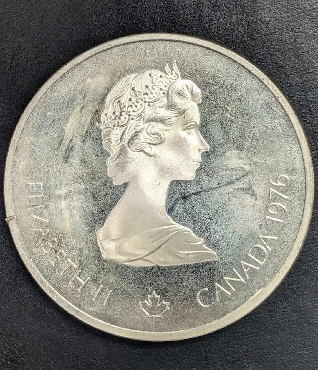 ., SILVER(48g), $10 OLYMPIACOIN, retail value .