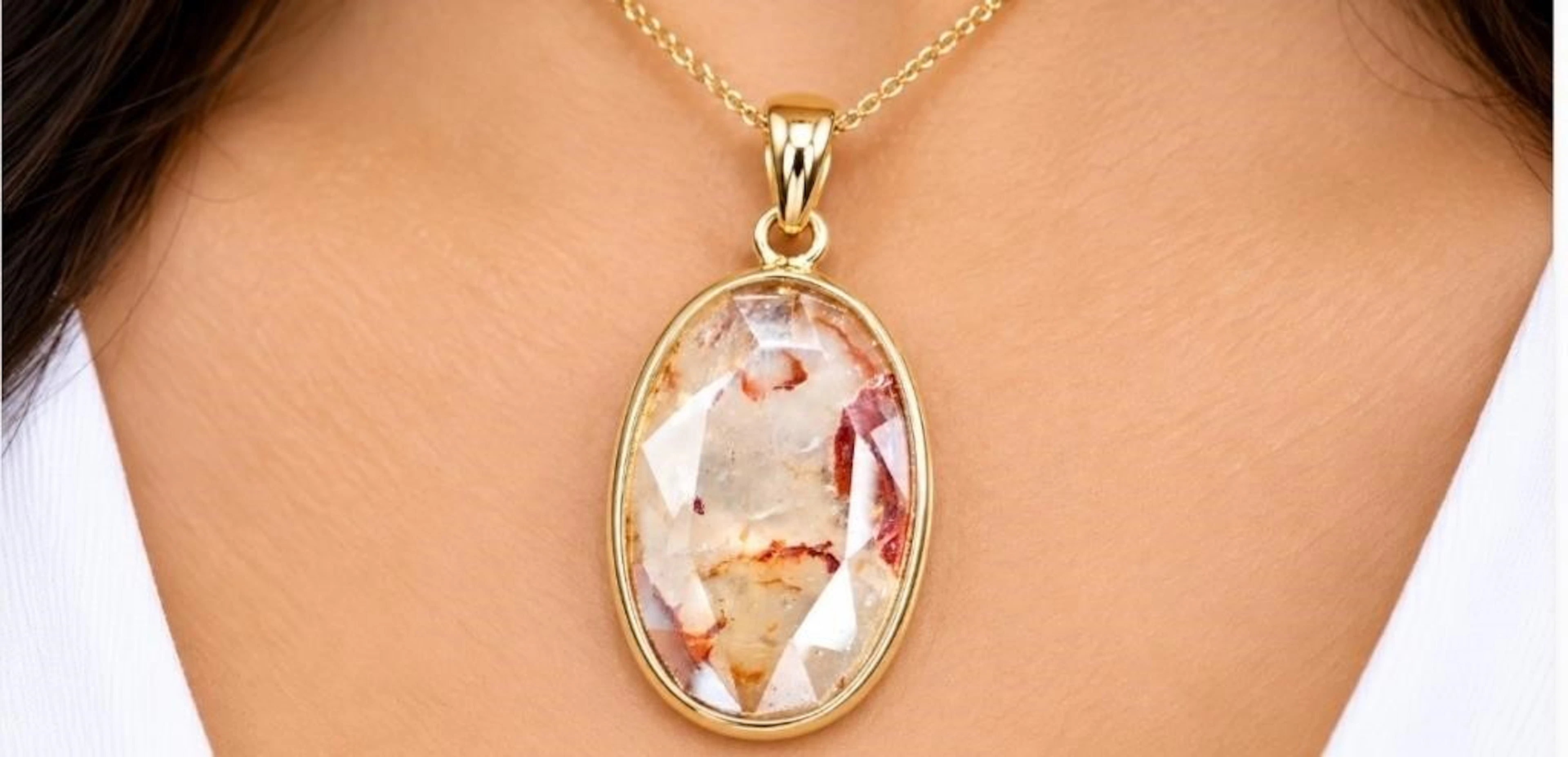 10k(0.6g), diamond (1.3ct)pendant, retail value $0