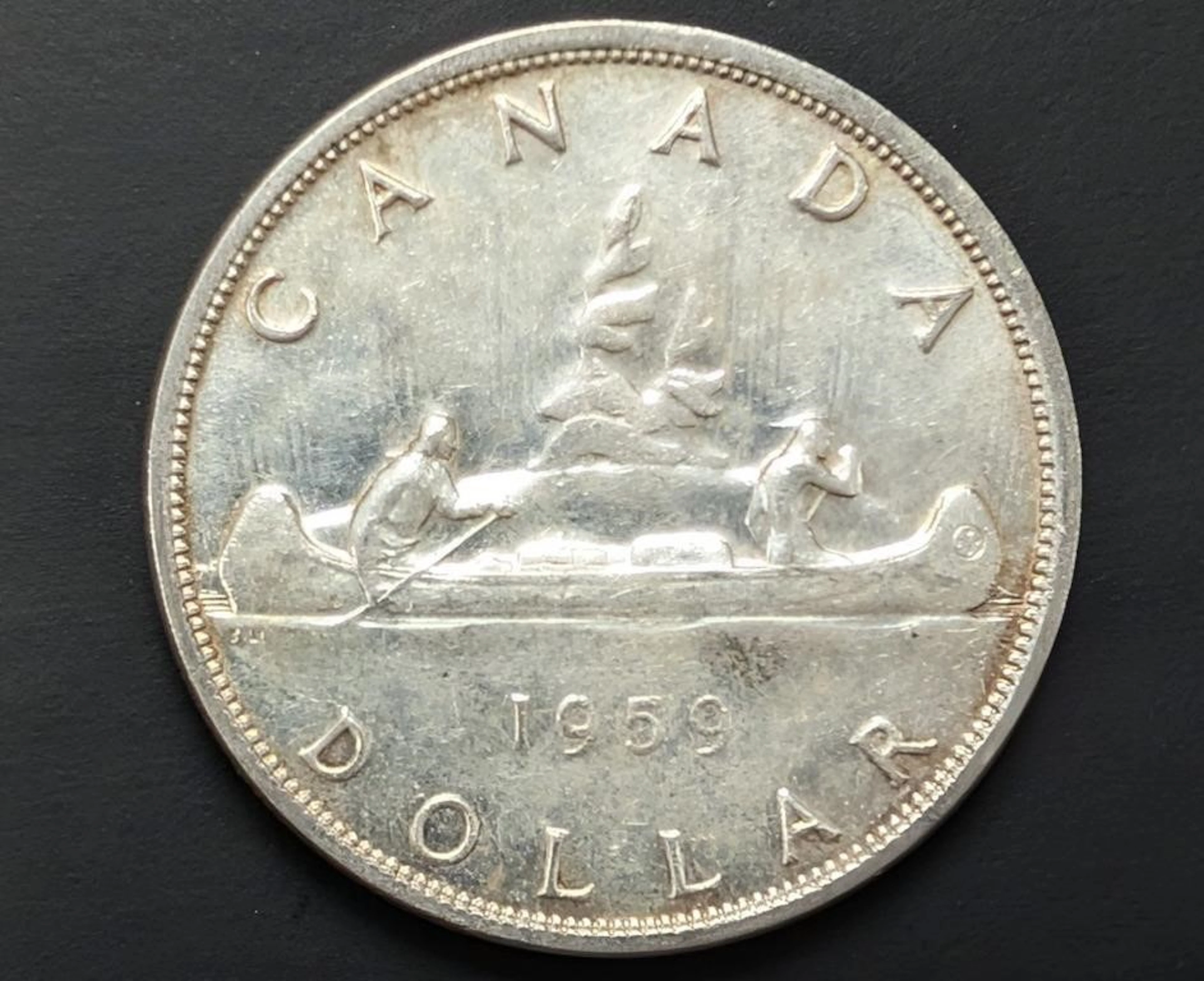 ., silver(23.18g), canada dollar (random date) ve