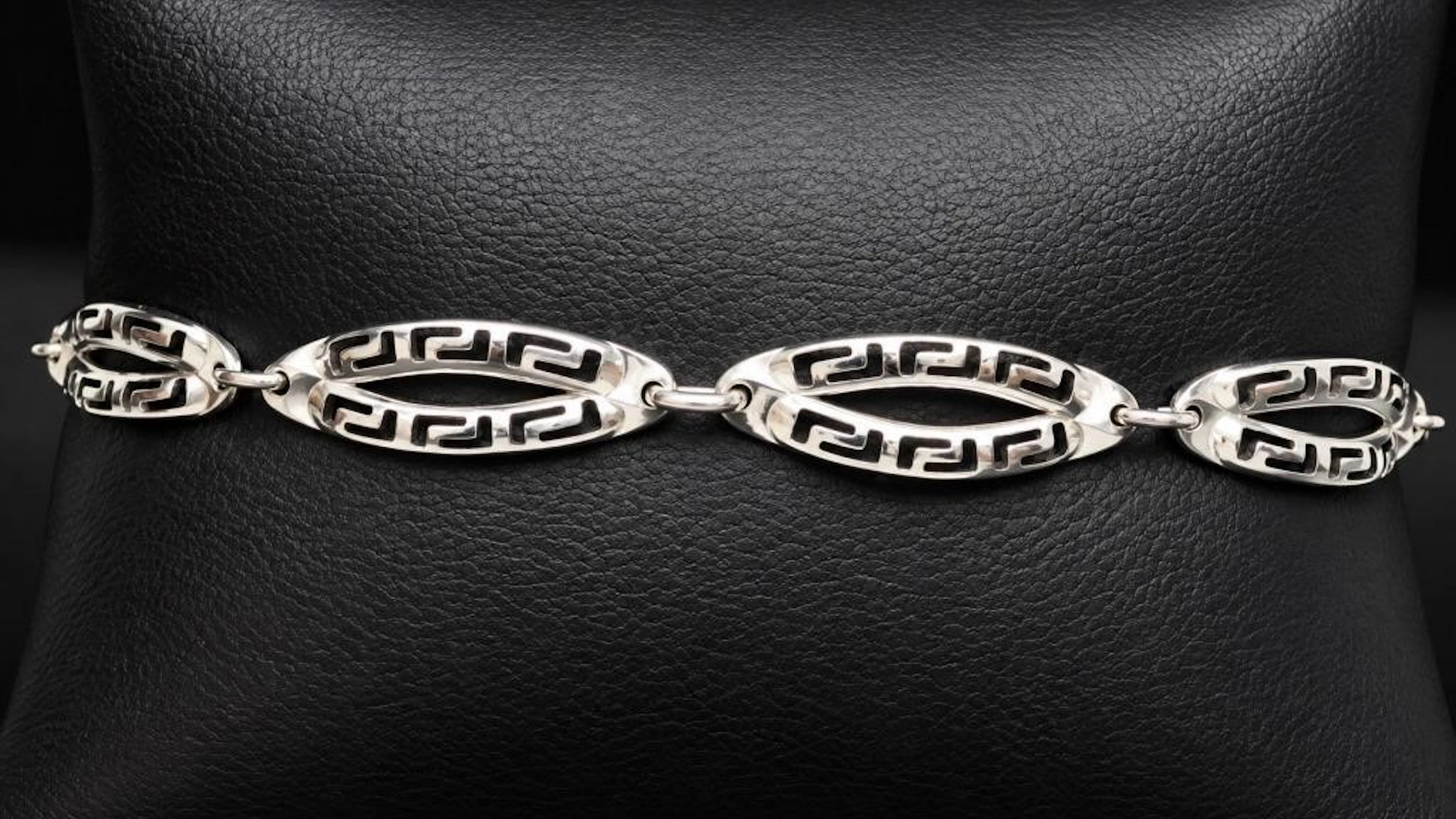 $1550, 10k(2.25g), bracelet 7", retail value $155