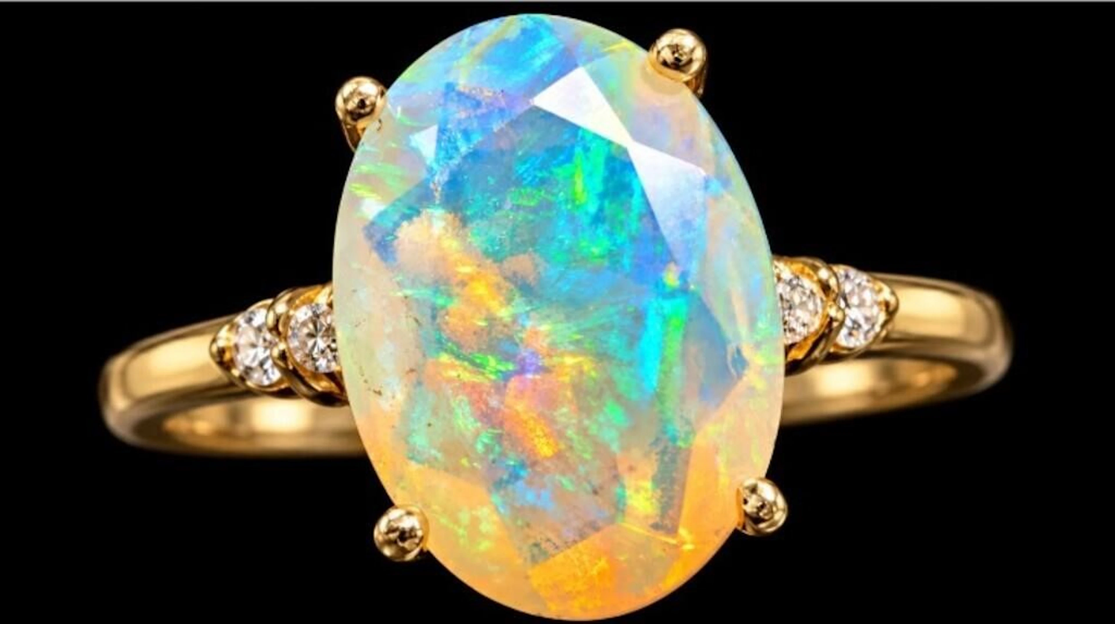 $2400, 10k(1.5g), opal (1.5ct), diamond (0.06ct)ri