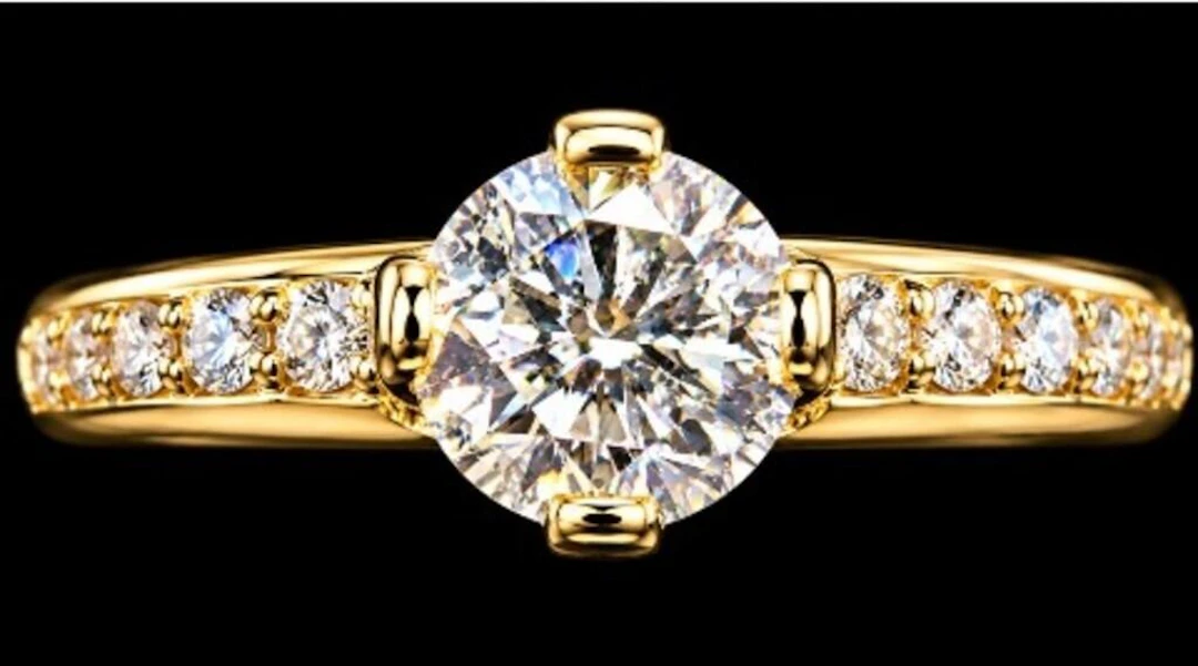 $3000, 10k(1.7g), lab diamond (0.55ct), cz (0.1ct)