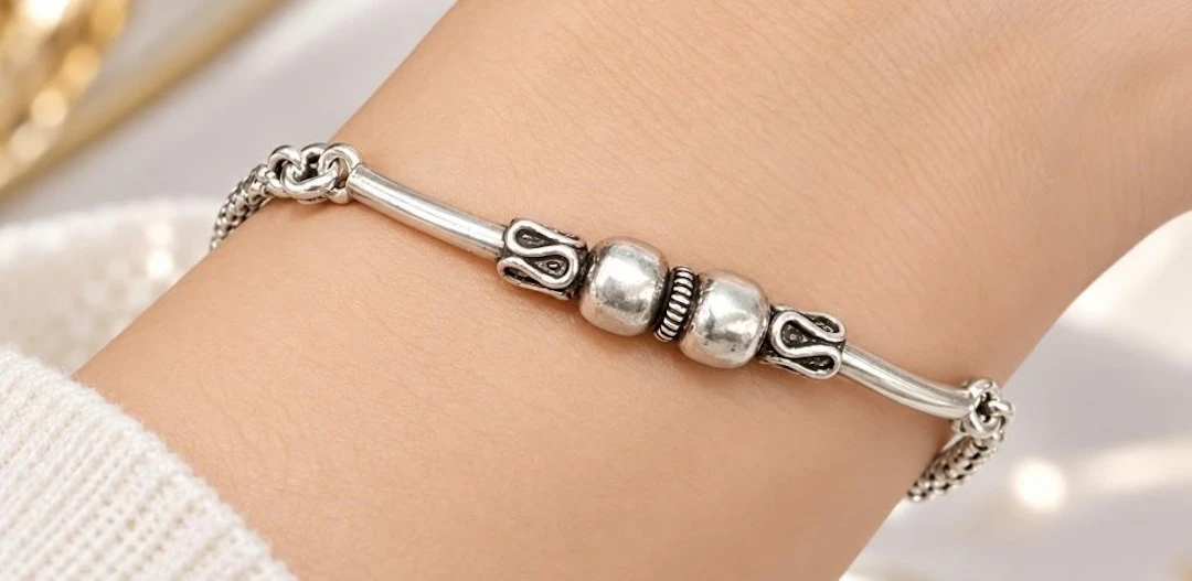 $120, silver(4g), bracelet 7", retail value $120