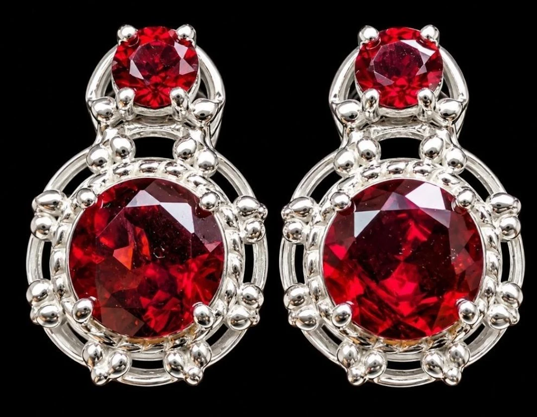 $400, silver(5.44g), garnet (1.5ct)earring, reta