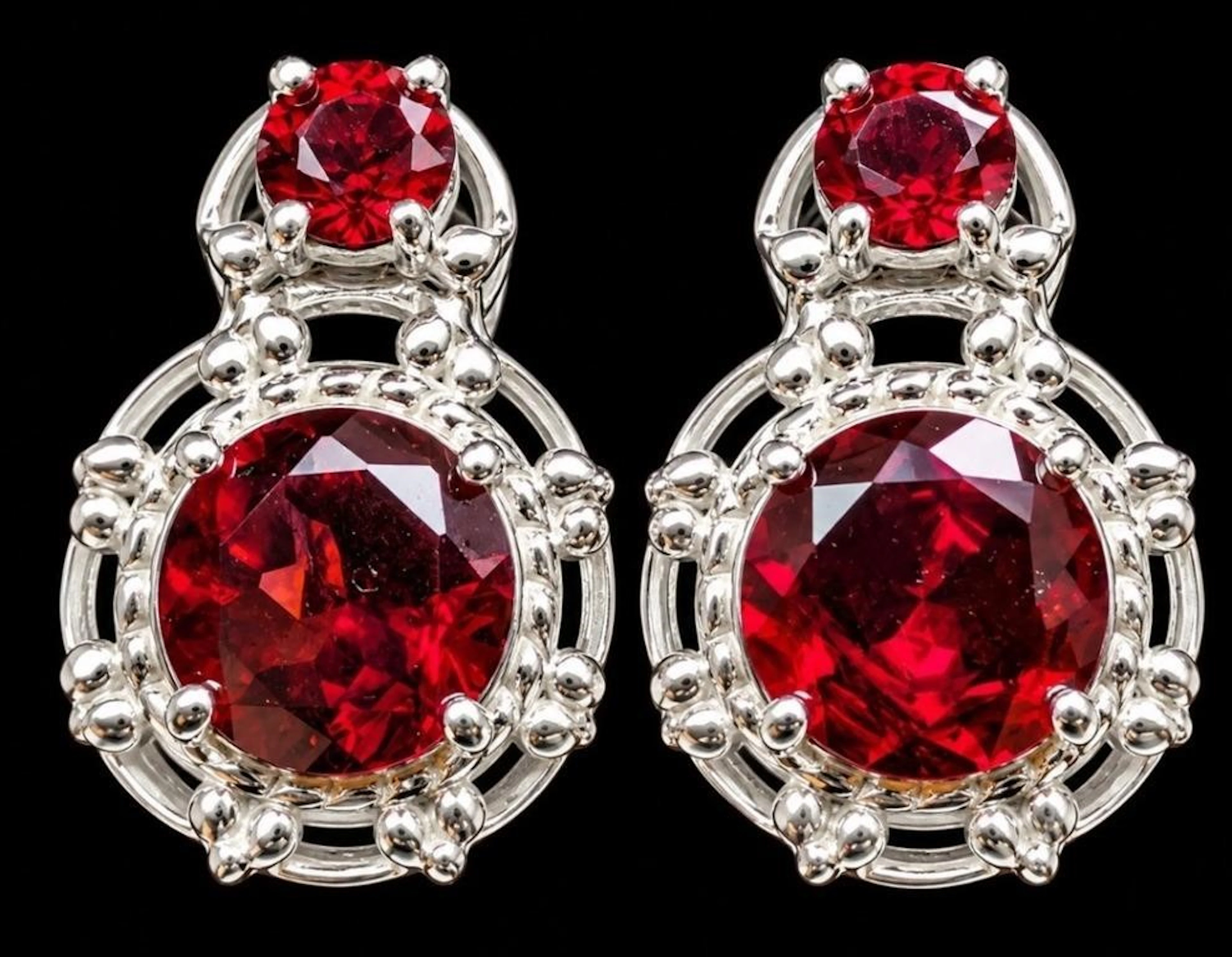 $400, silver(5.44g), garnet (1.5ct)earring, reta