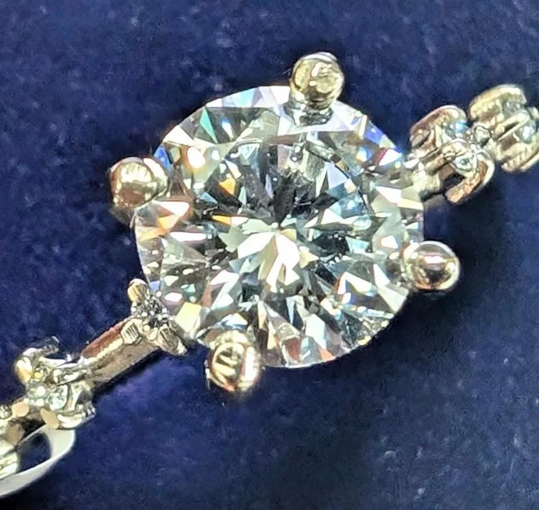 $2000, 10k(1.85g), lab diamond (1.25+0.06ct) ring