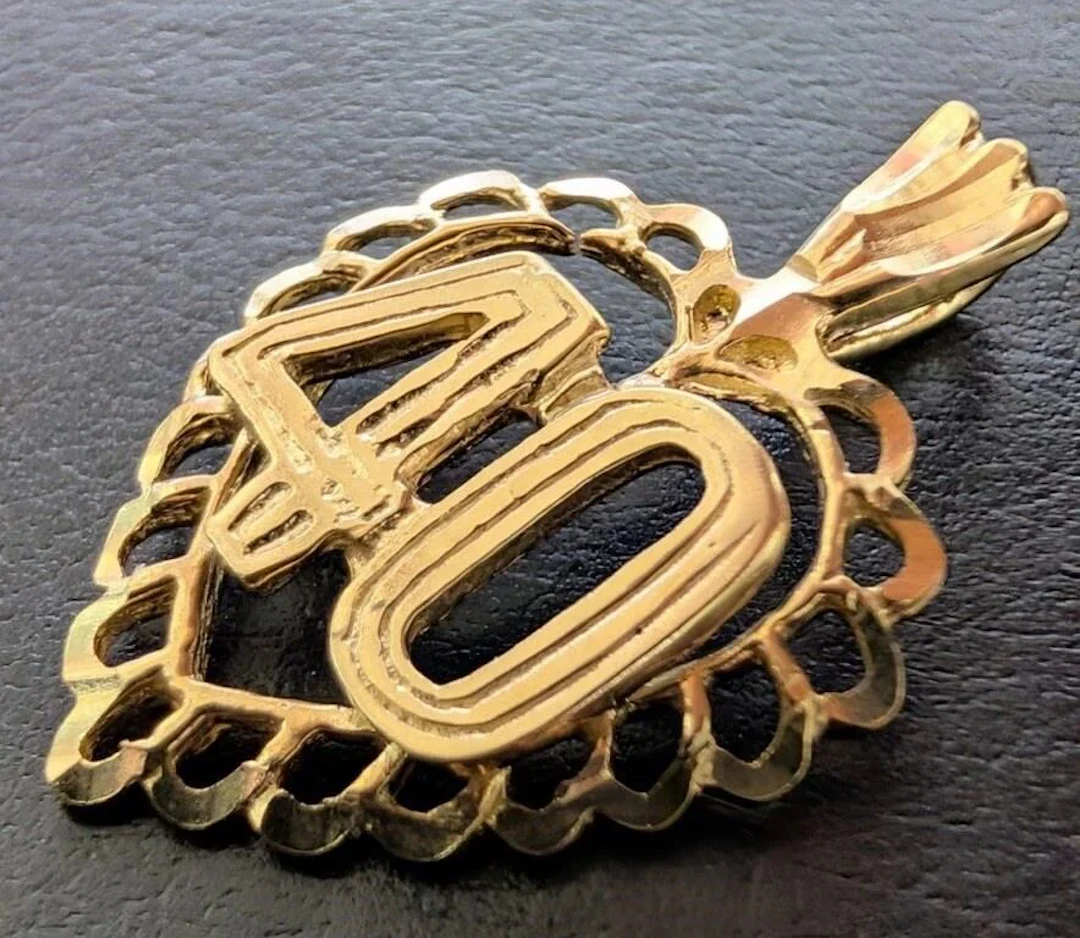 $700, 10K(1g), PENDANT, retail value $700