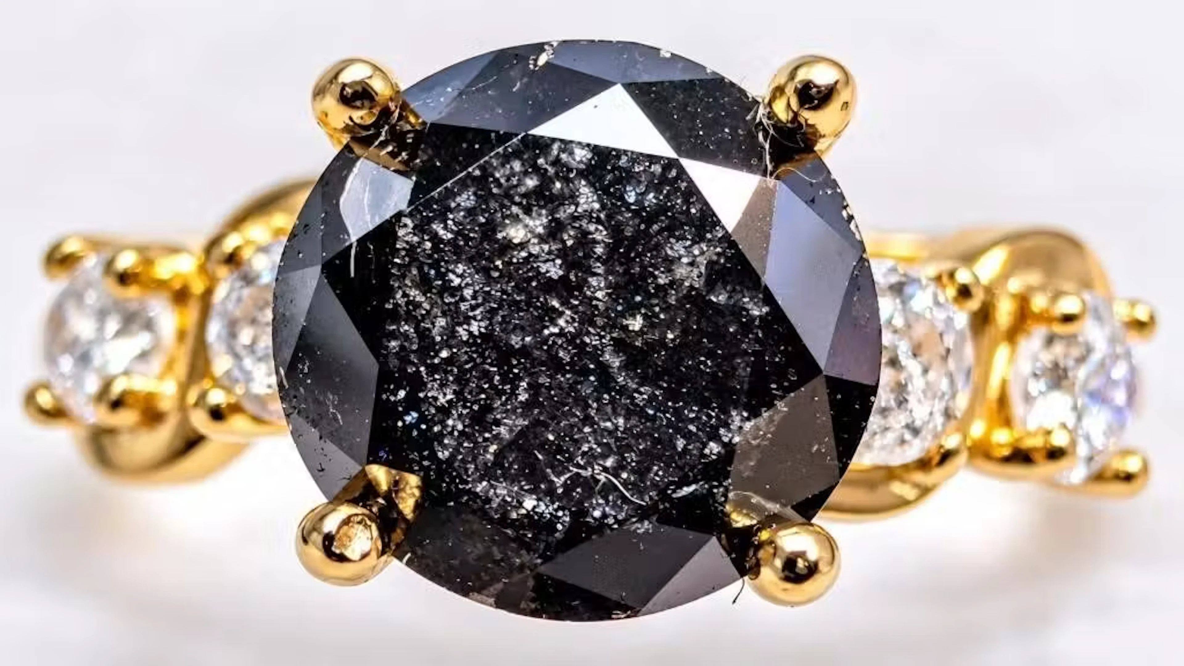 $2550, 10k(2g), black diamond (1.95ct), diamond (0
