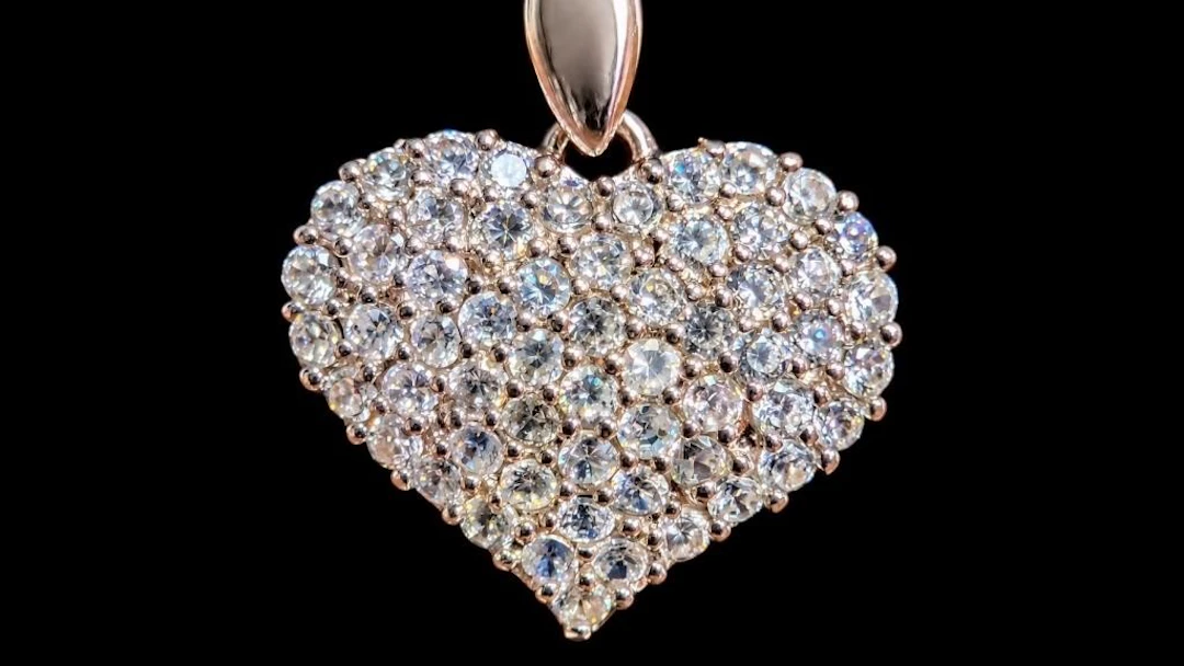 $1000, 10k(2.72g), cz (0.1ct)pendant, retail value