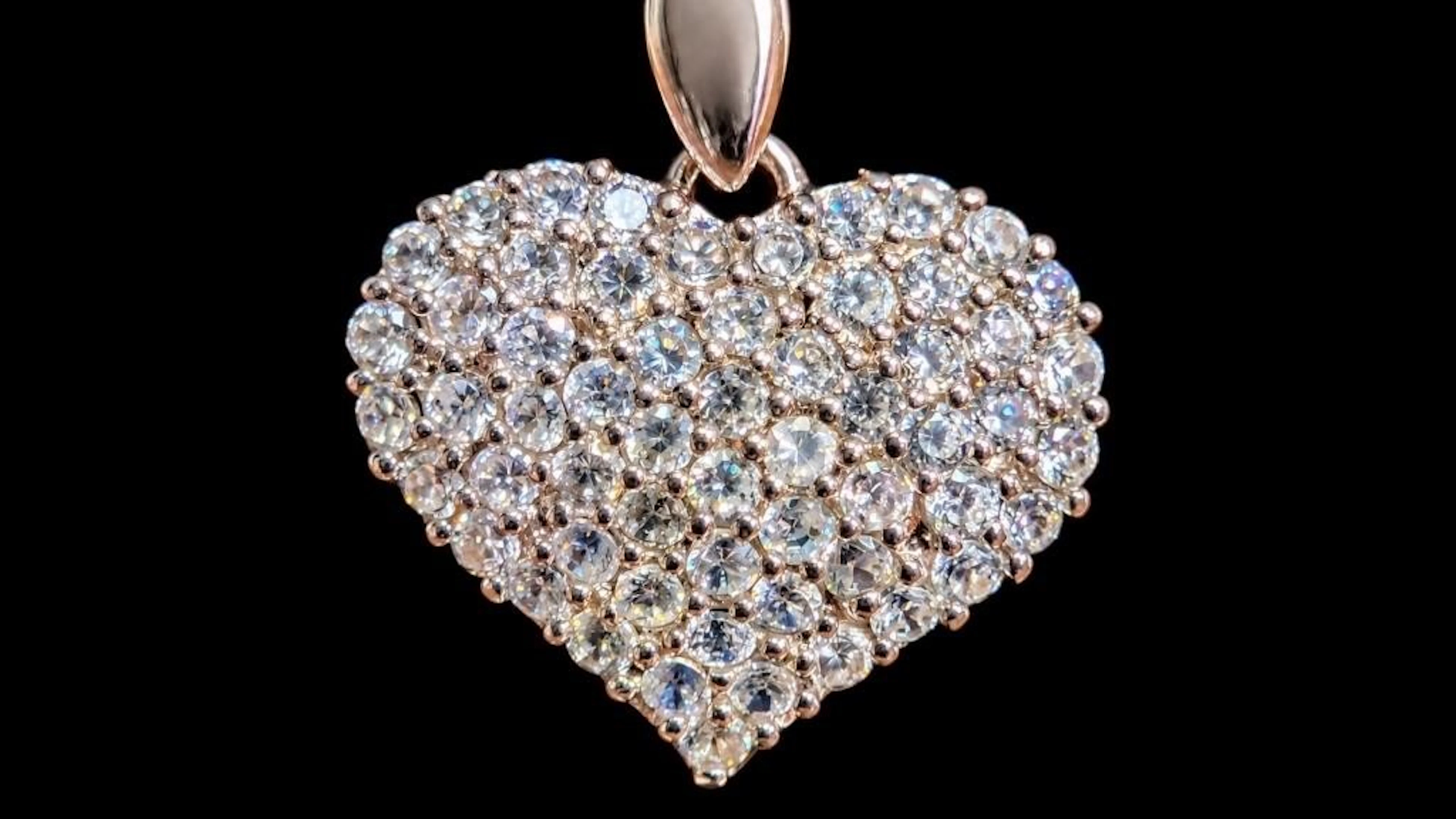 $1000, 10k(2.72g), cz (0.1ct)pendant, retail value