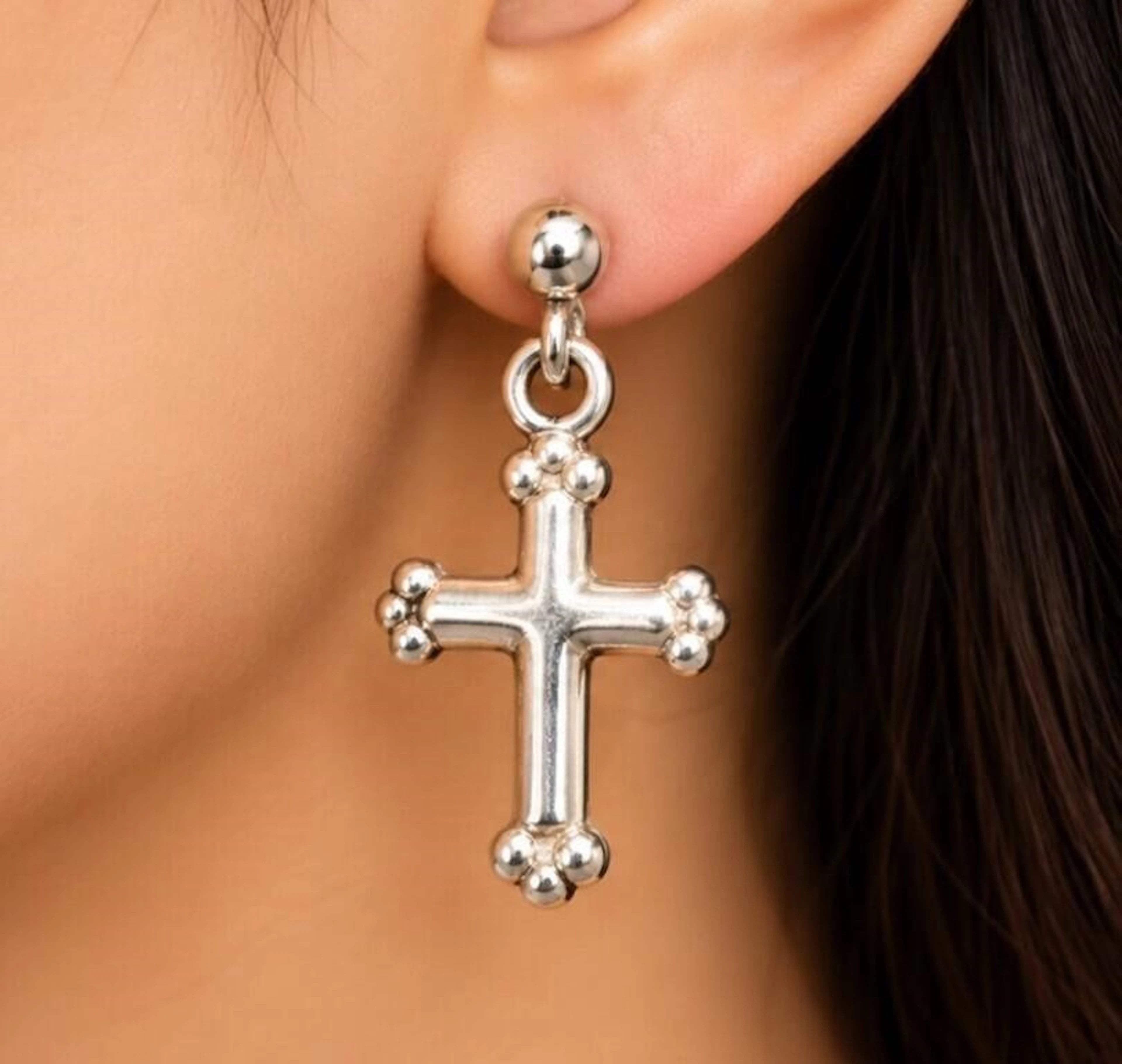 $30, silvercross earring, retail value $30