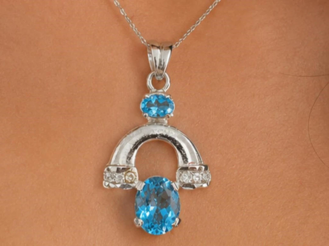 $135, Silver(5.24g), Blue Topaz&czPendant, apprais