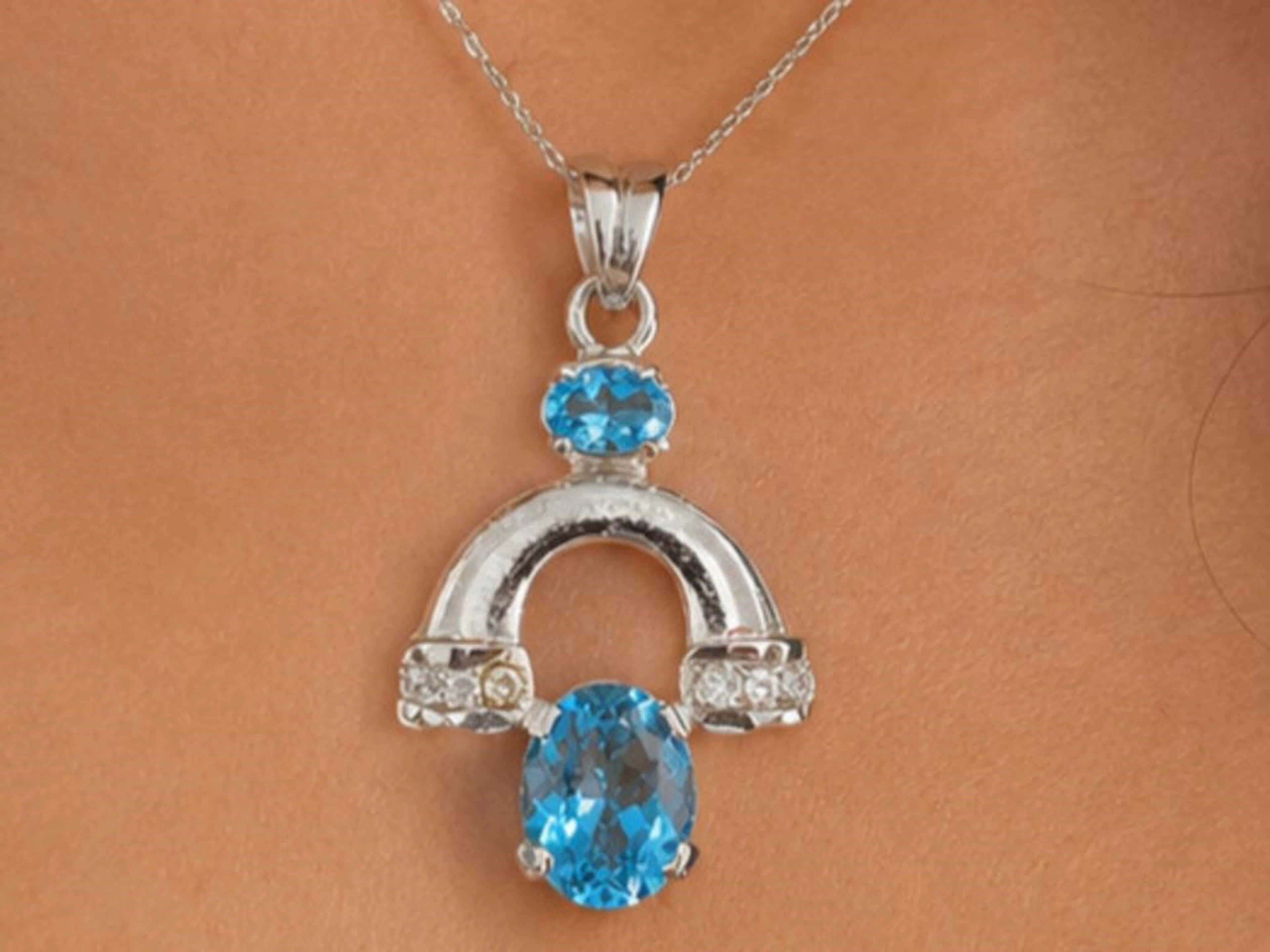 $135, Silver(5.24g), Blue Topaz&czPendant, apprais