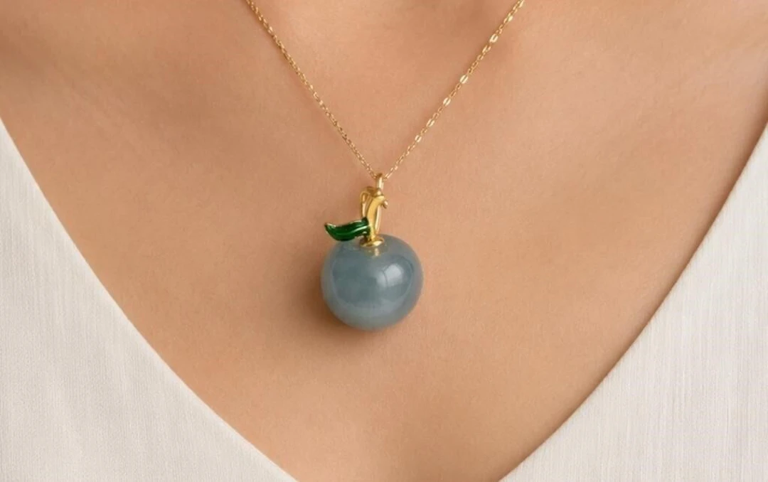 $50$100, fluorite apple pendant