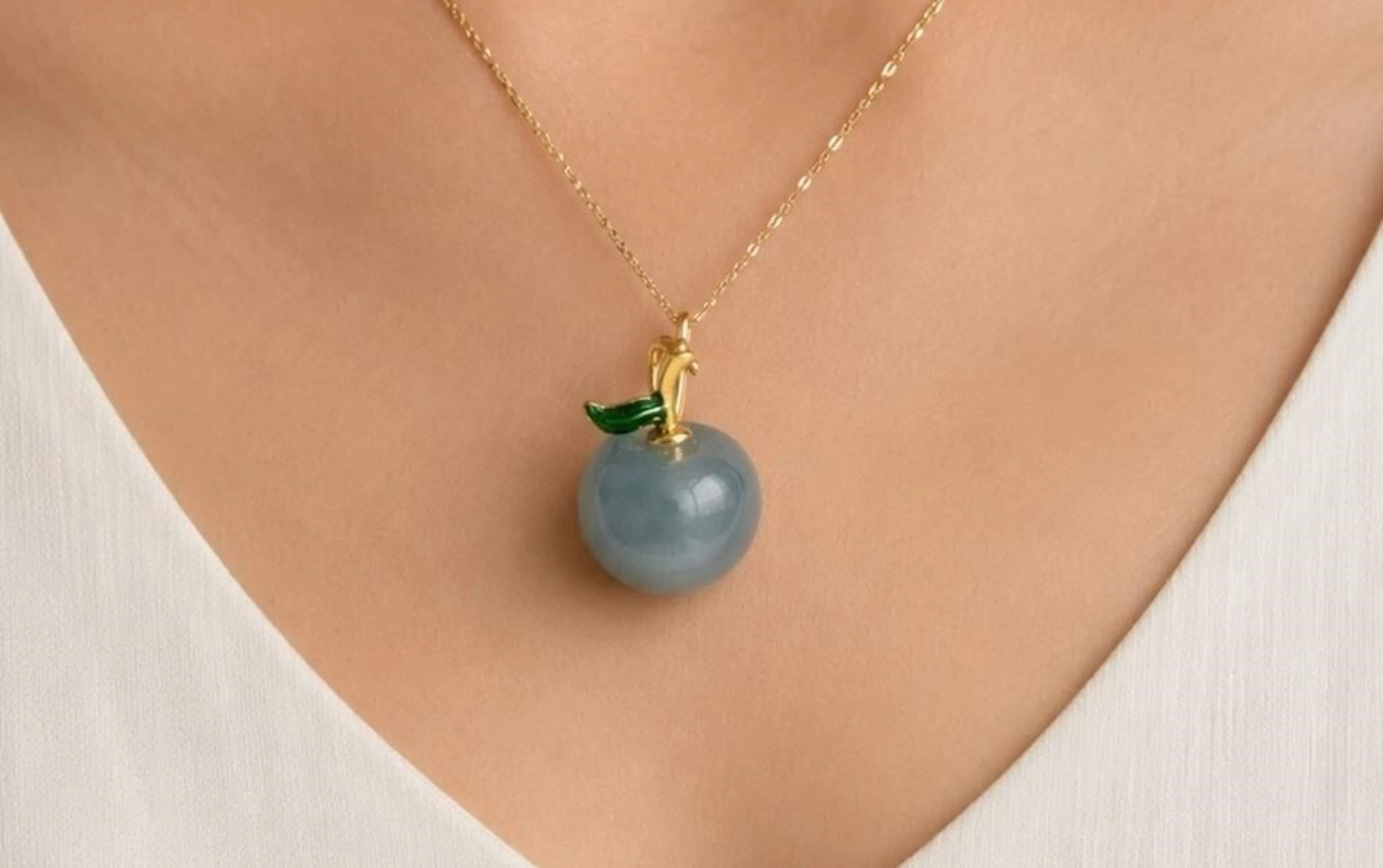 $50$100, fluorite apple pendant
