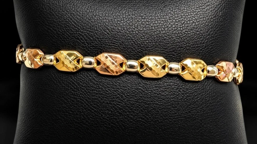$3800, 10k(5.41g), bracelet 7.5", retail value $3