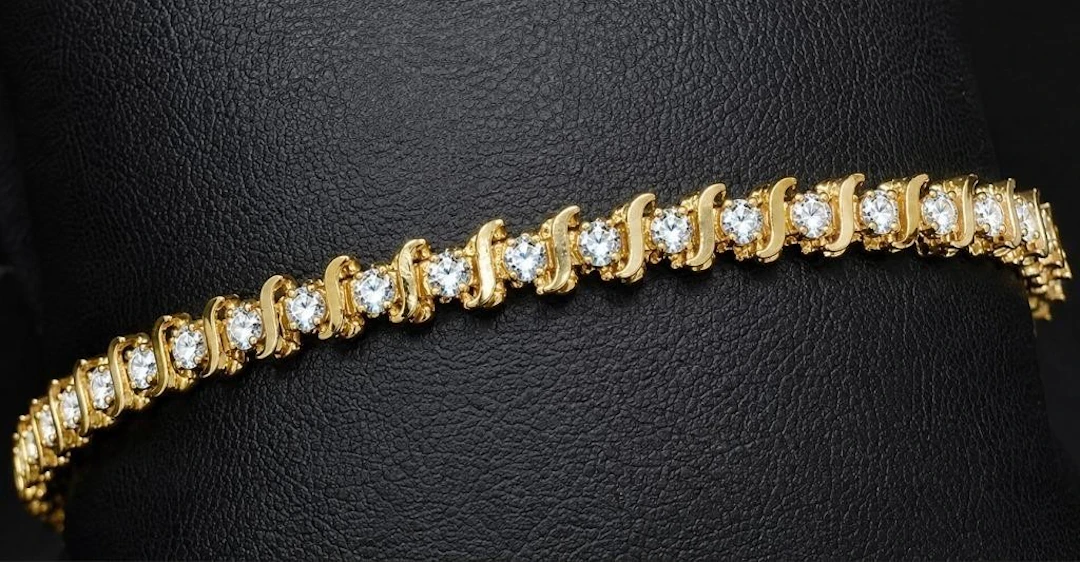 $4500, 10k(5.9g), natural diamond (0.5ct) bracele