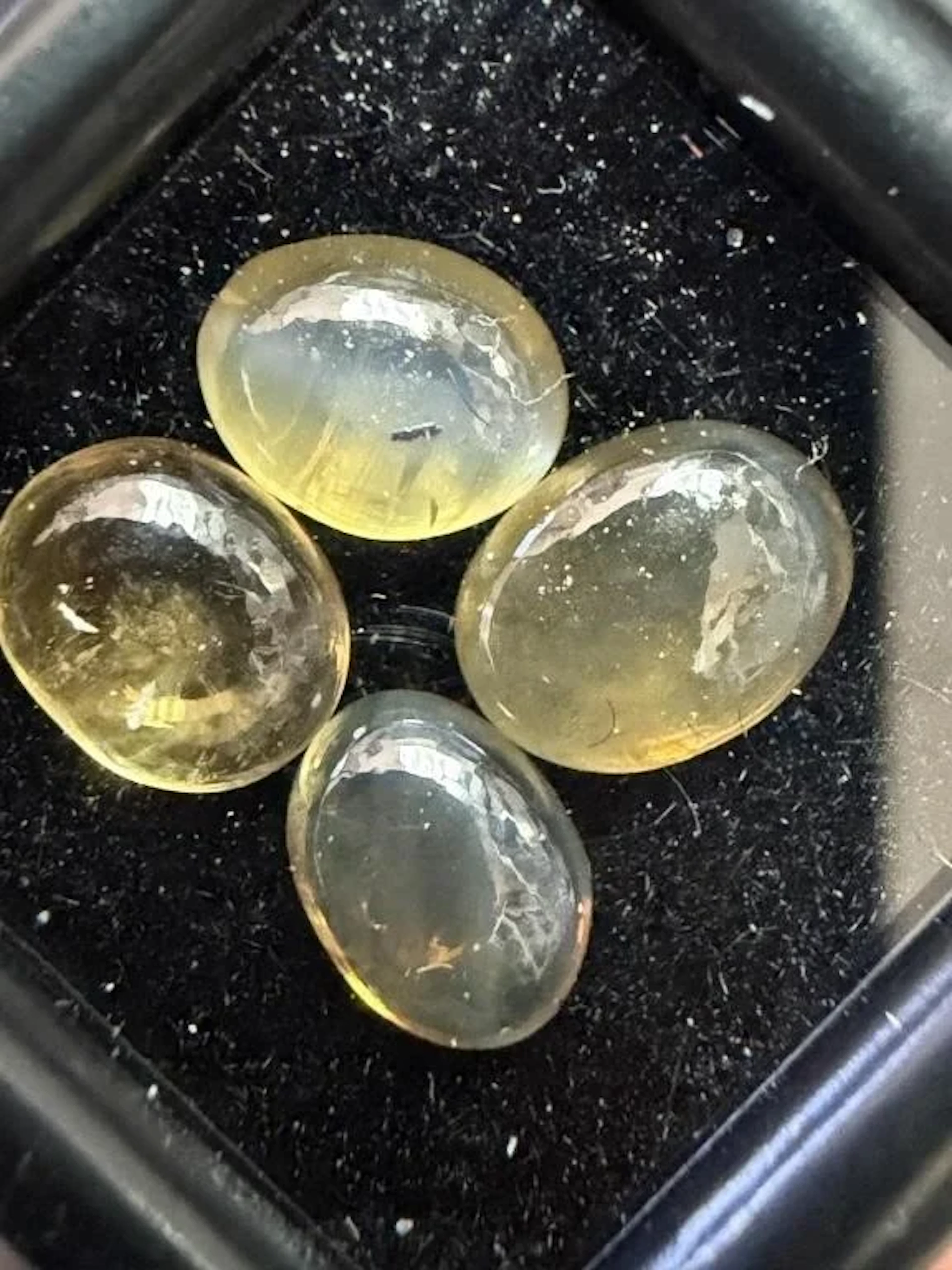 $100, natural cats eye (3ct), retail value $100