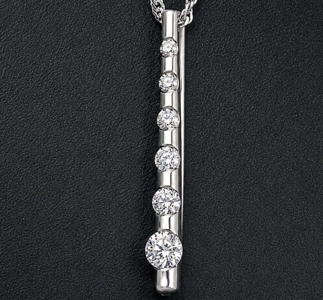 $2600, 14k(1.25g), natural diamond (0.27ct) neckl