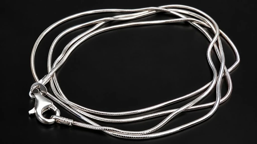 $150, silver(5.2g), chain 24", retail value $150