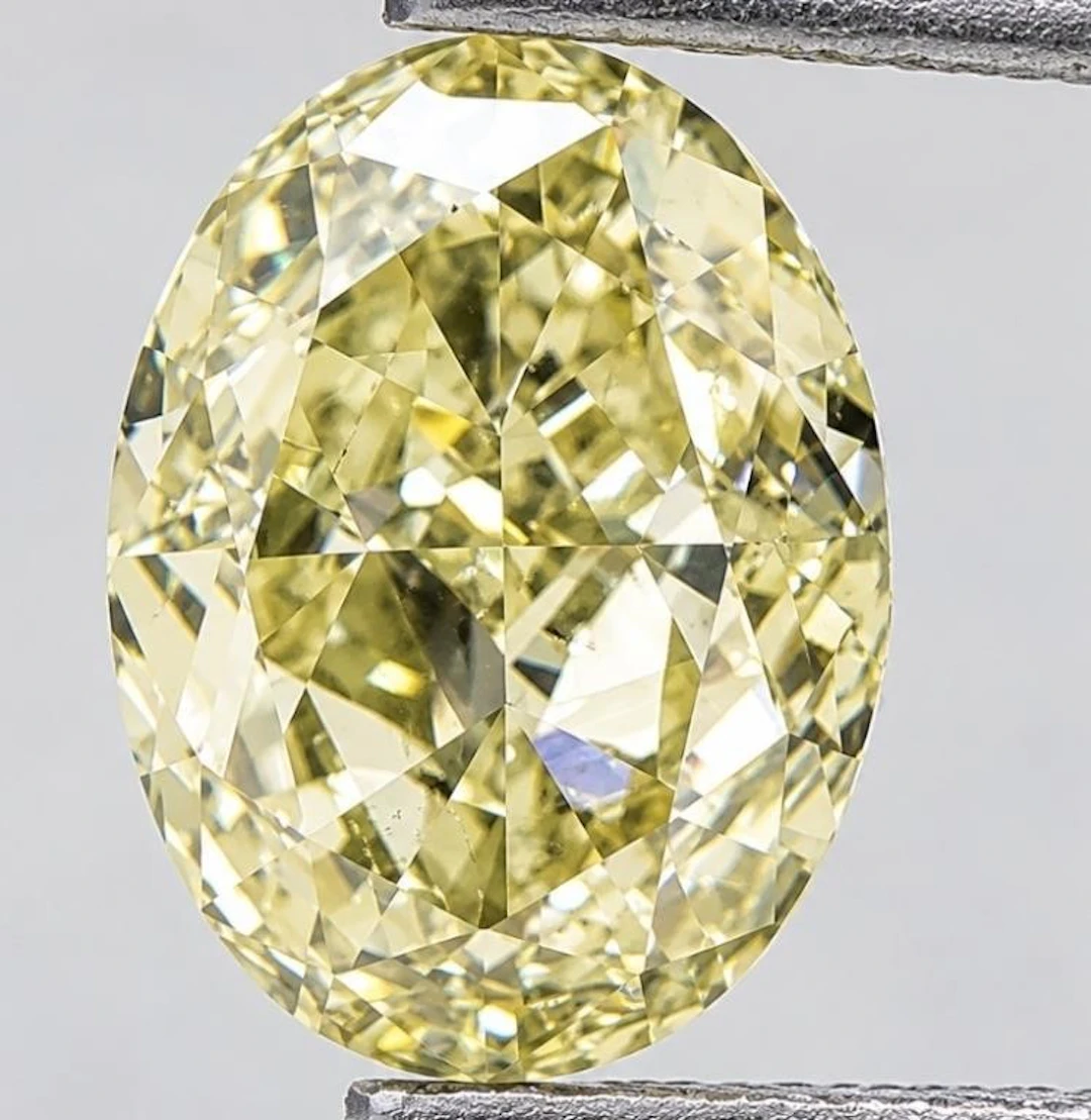 $7652 GIA Certified, natural diamond 0.61ct.Oval