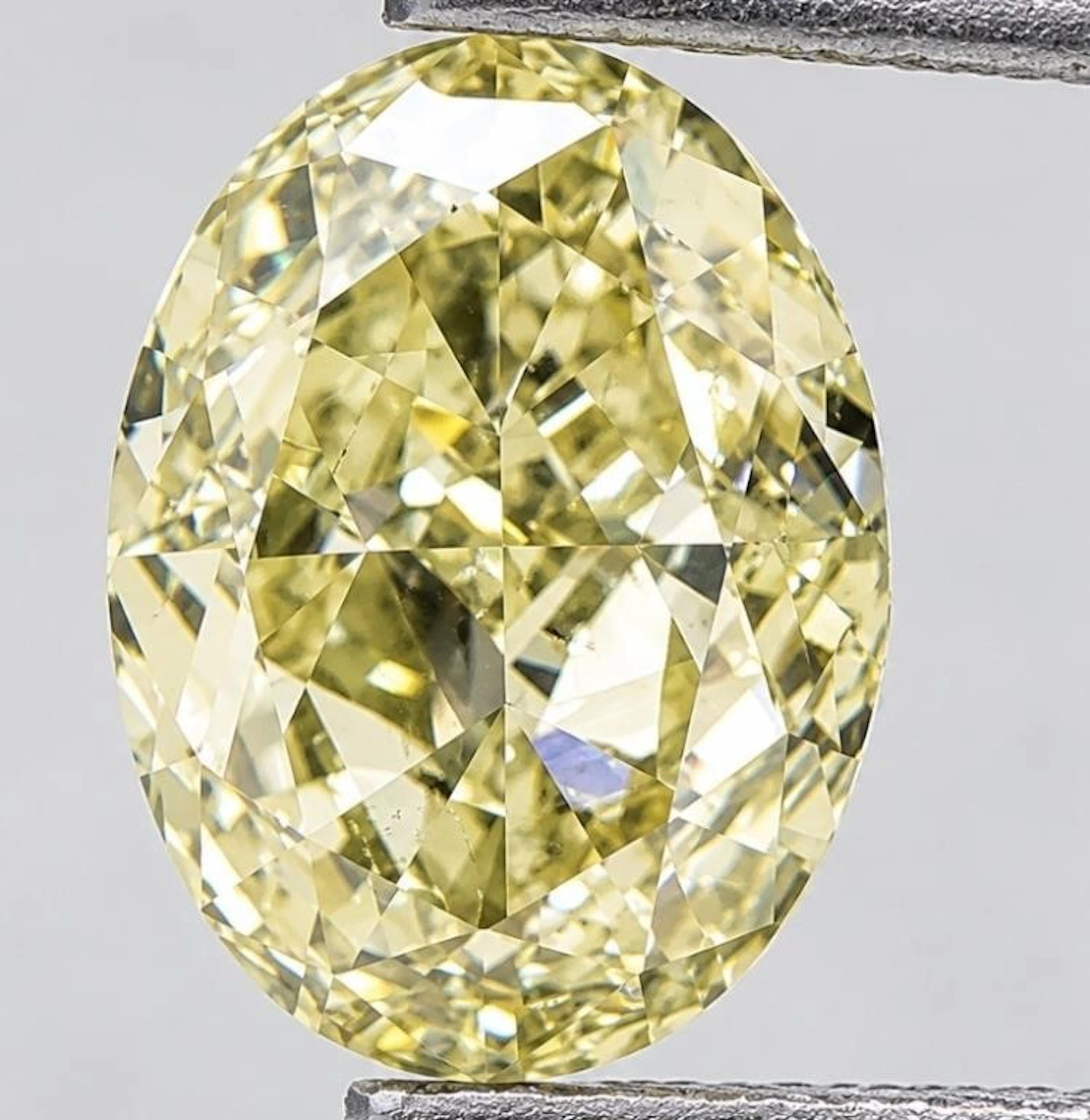 $7652 GIA Certified, natural diamond 0.61ct.Oval