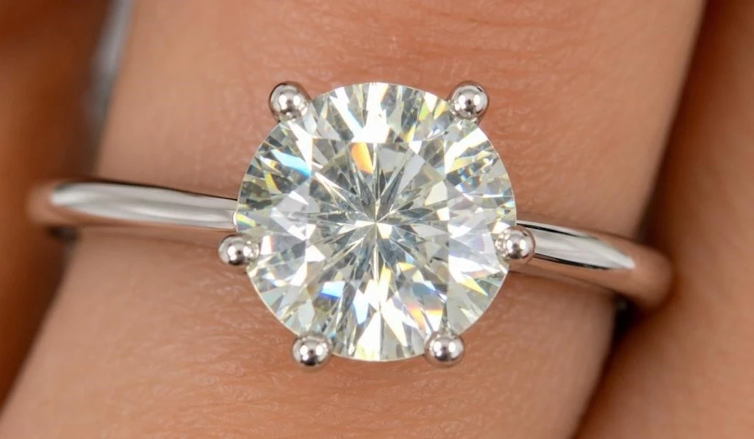 $1585, 10k(2.06g), moissanite (1ct)ring, size 6, a