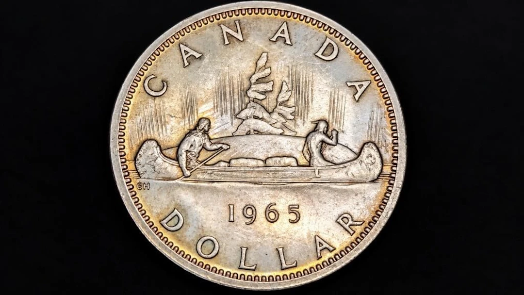 $700, silver(23.4g), canada dollar (1965)coin, ret