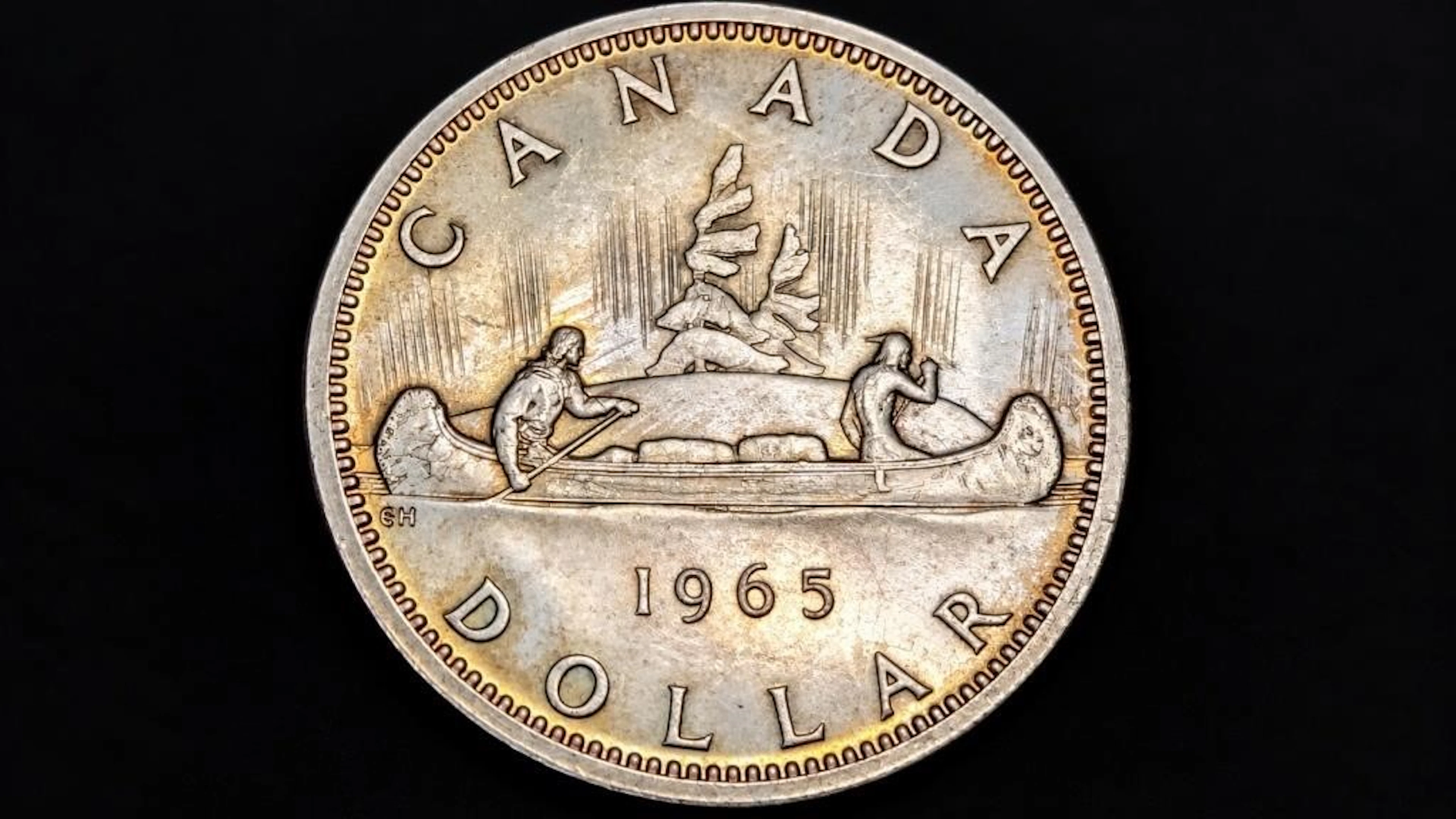 $700, silver(23.4g), canada dollar (1965)coin, ret