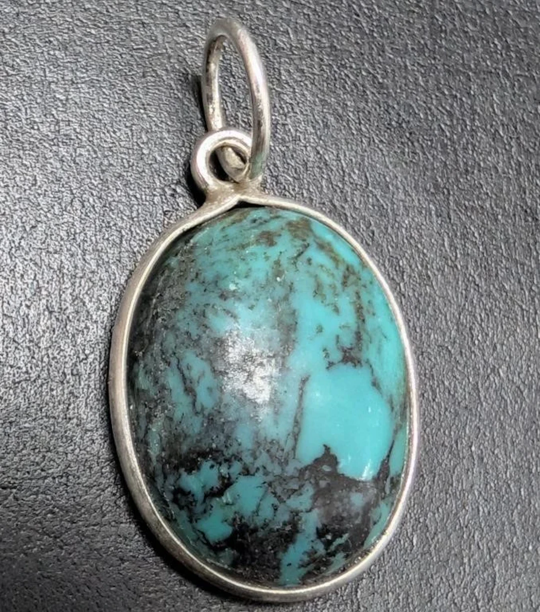 $120, silver turquoise pendant, retail value $120
