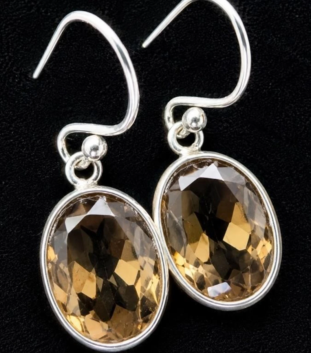 $240, silver(3.3g), smokey quartz (12ct) earring
