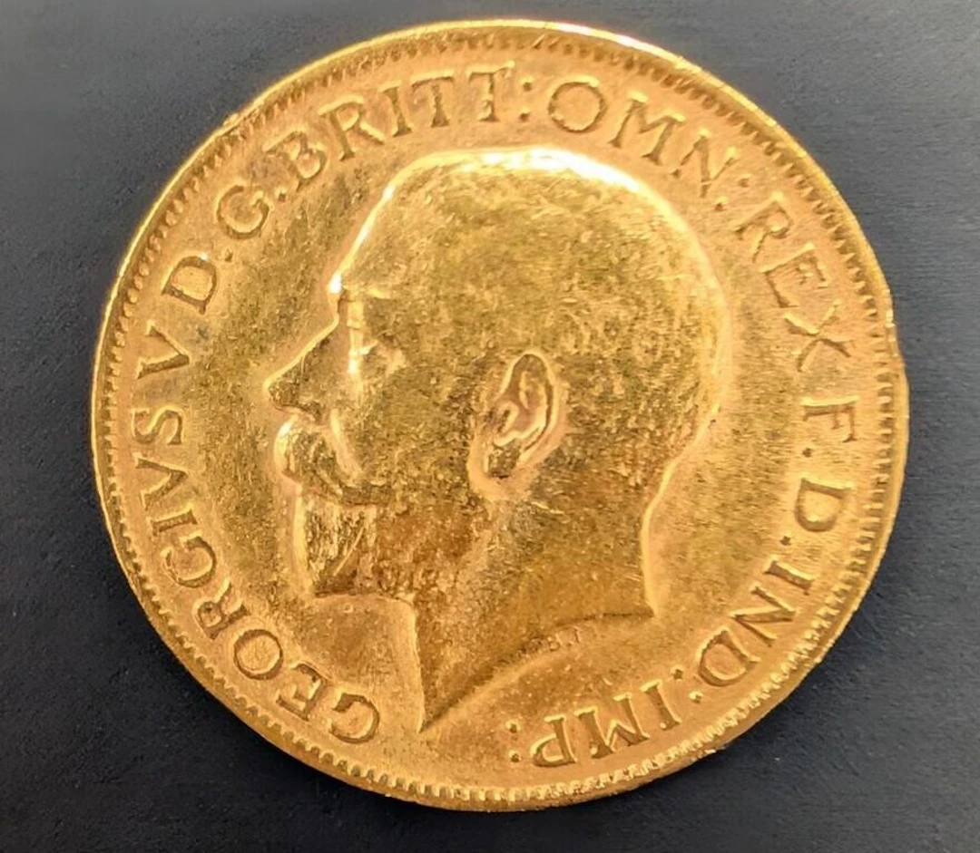 ., 22k(7.96g), 1912 sovereign coin, retail value .