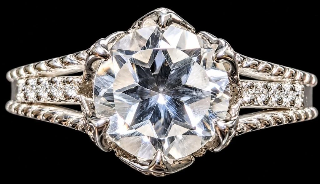 $250, silver(4.14g), white topaz (1.5ct)ring, si