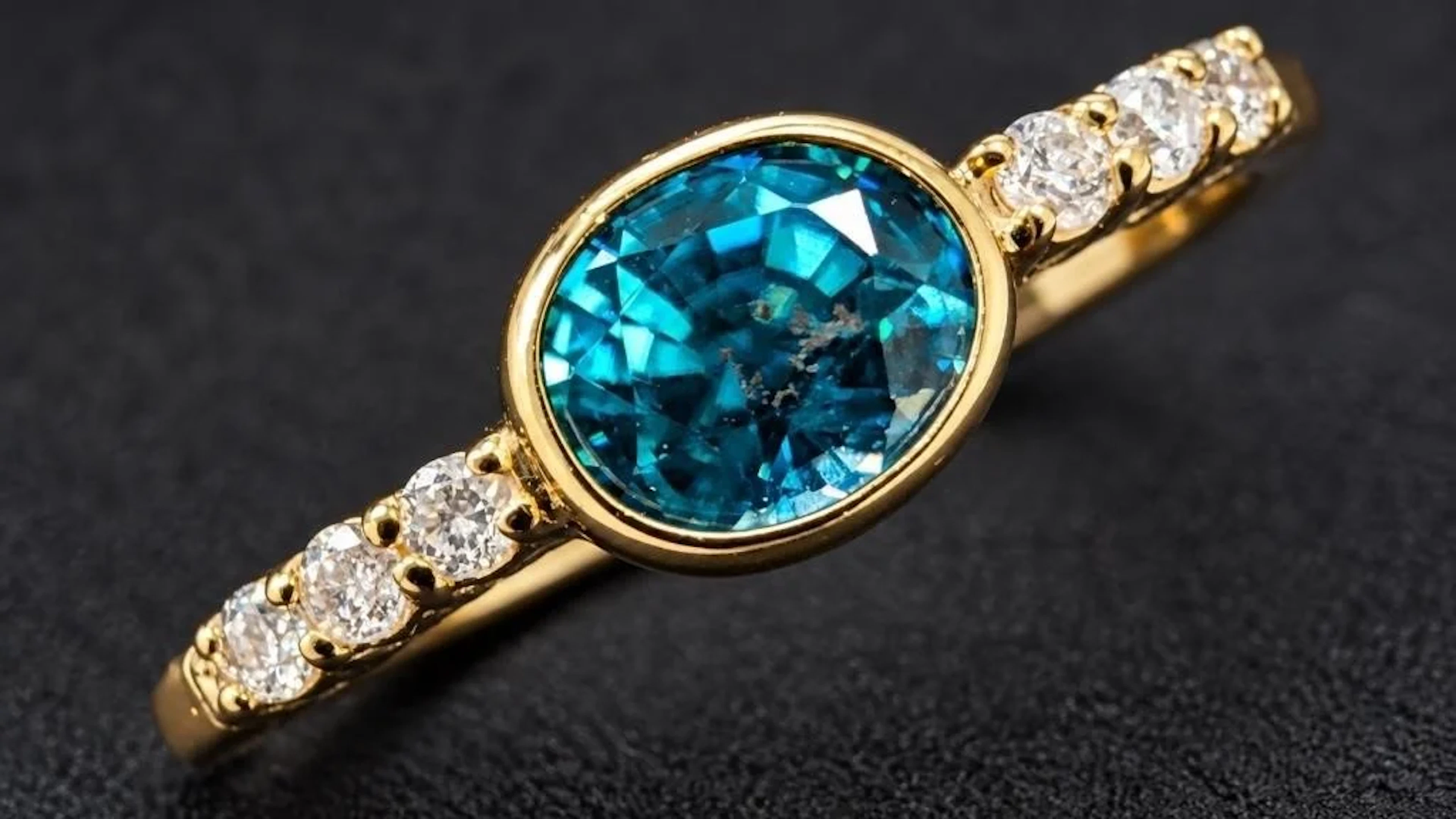 $2400, 10k(1.5g), blue zircon (1.2ct), diamond (0.