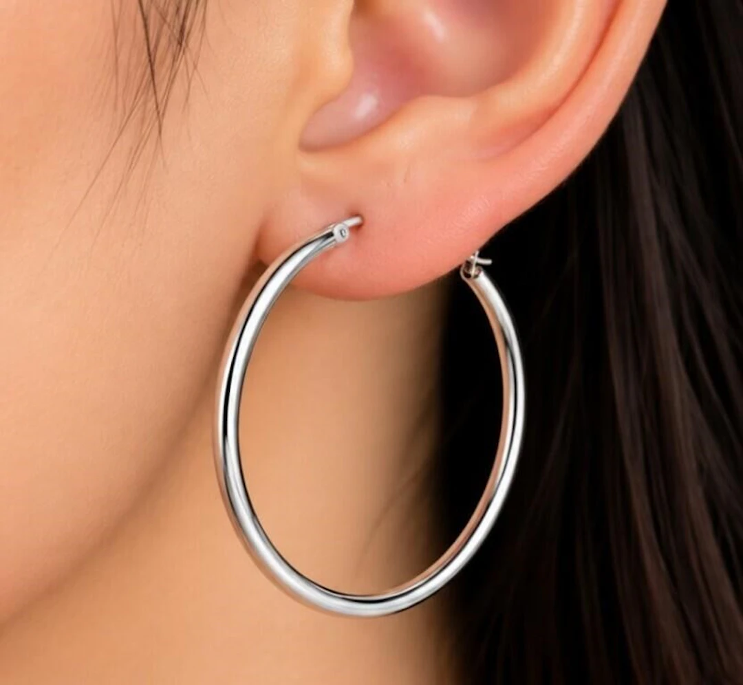$80, silver(1.49g), earring, retail value $80