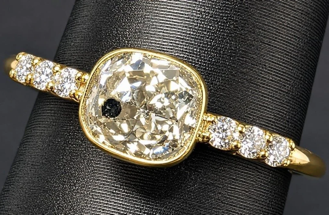 $5000, 10k(1.42g), natural diamond (1.1+0.06ct)r