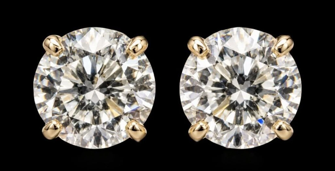 $400, 14kmoissanite (0.45ct)earring, retail value