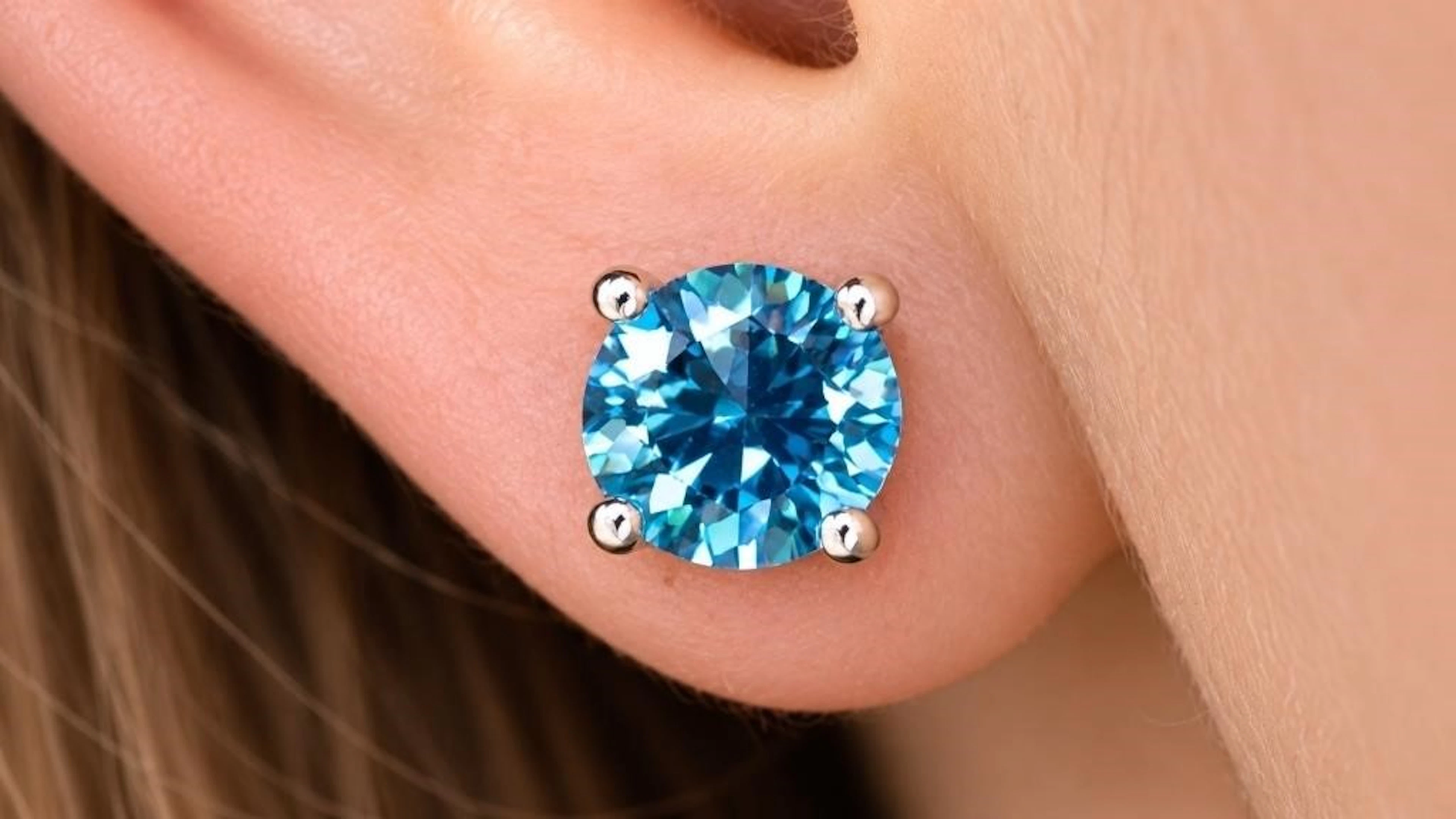 $1050, 10k(0.6g), blue lab diamond (0.55ct)earring