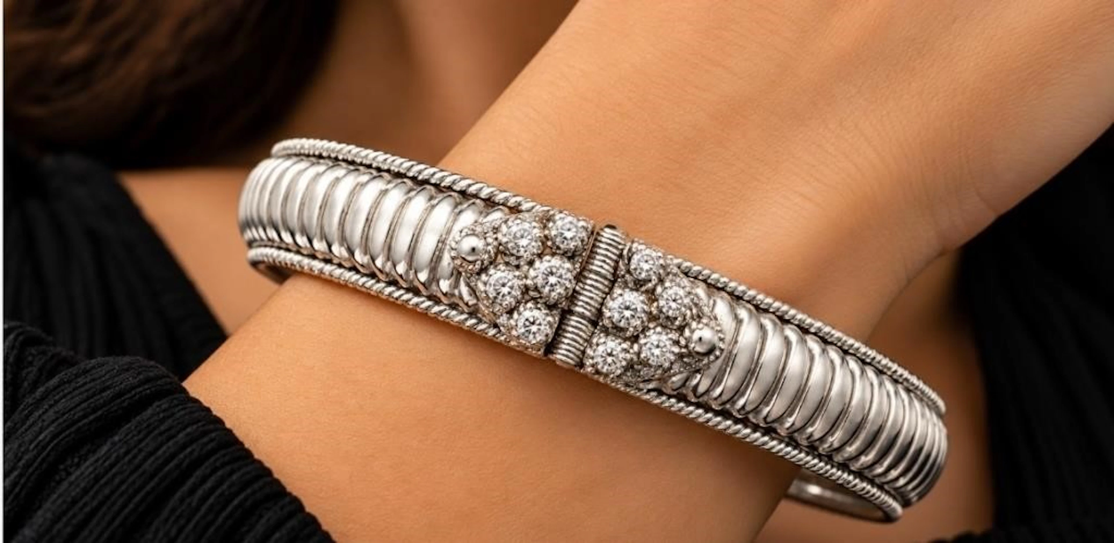 $550, silver(18.5g), bangle, retail value $550