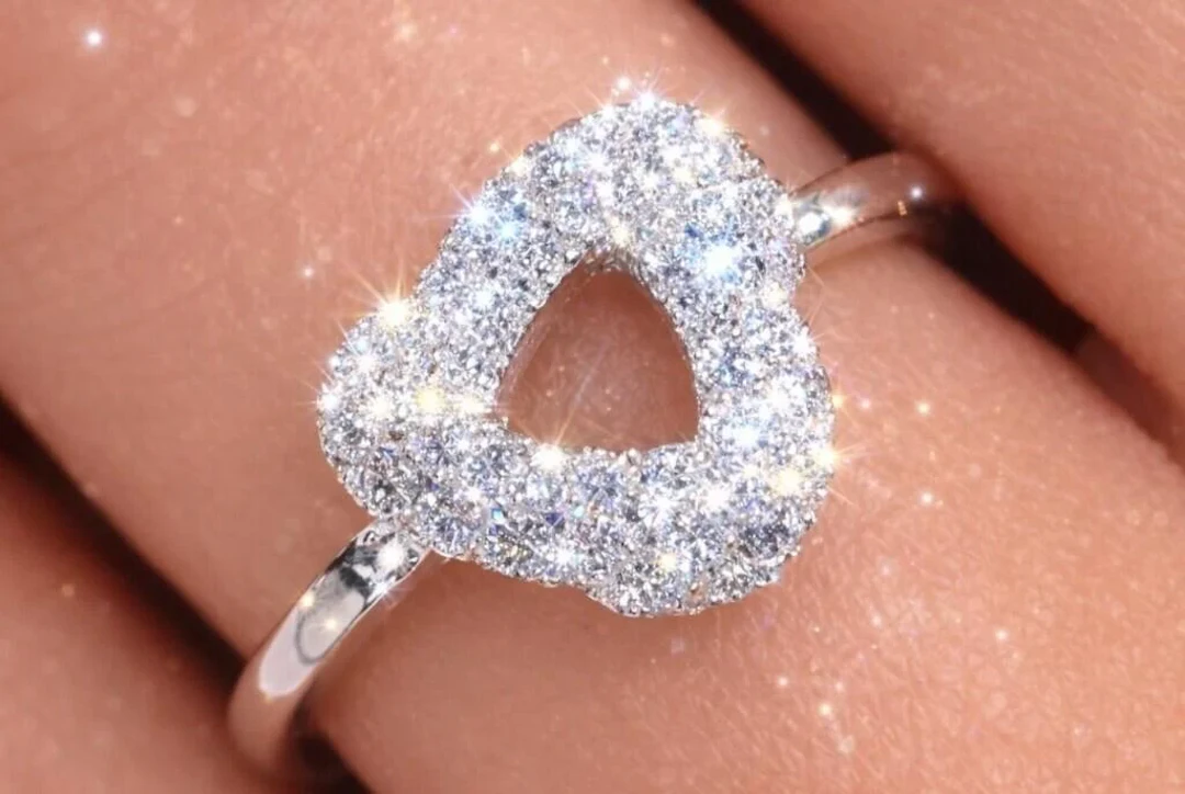 $4000, 14k(1.6g), natural diamond (0.55ct)ring, si