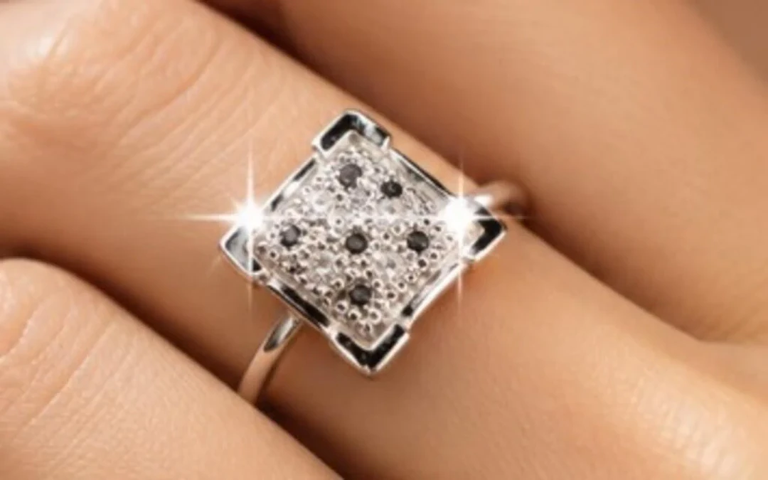 $1100, 10k(1.56g), diamond (0.01ct)ring, size 6.5