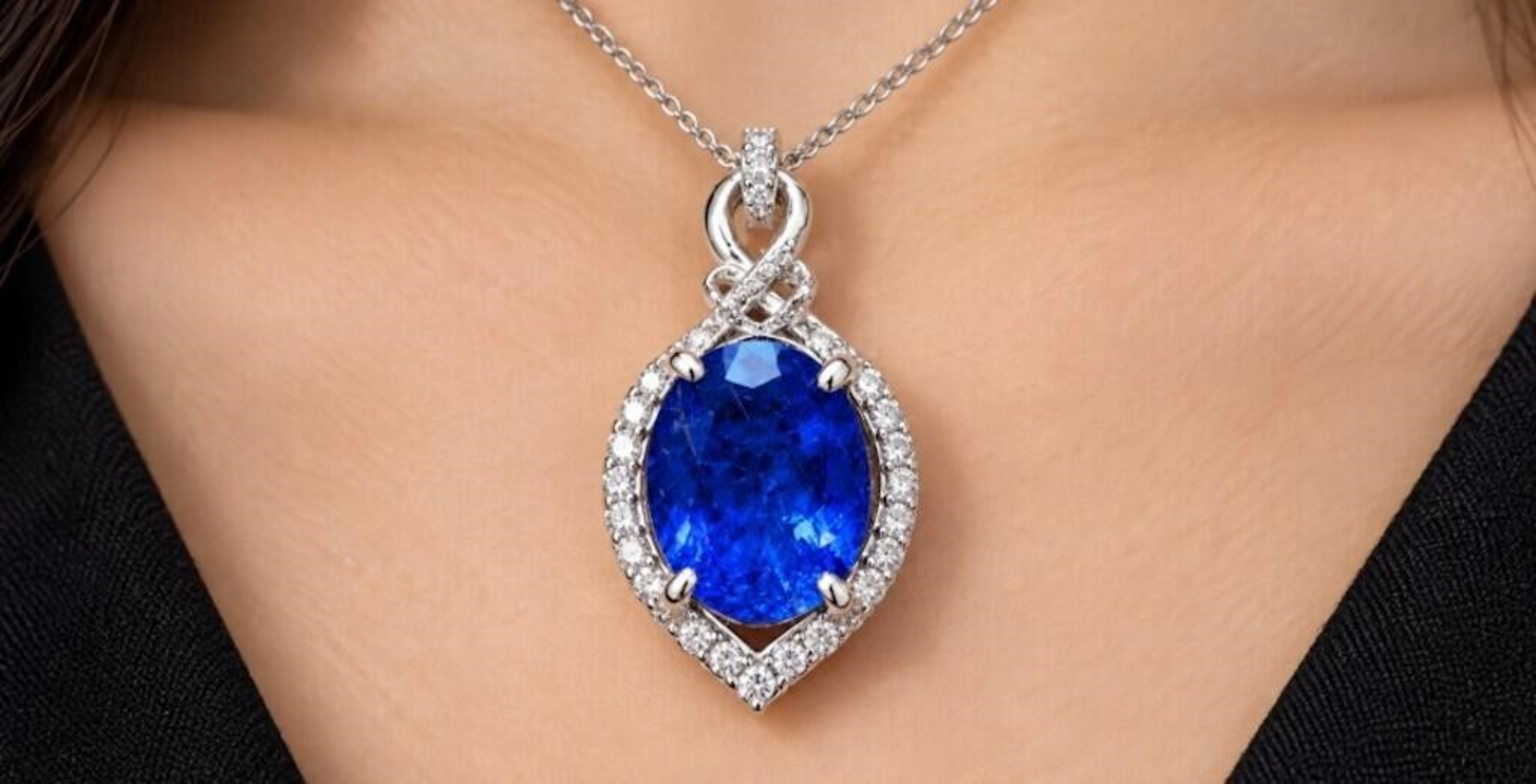 $7650, 14k(4.1g), tanzanite (5ct), diamond (0.41ct