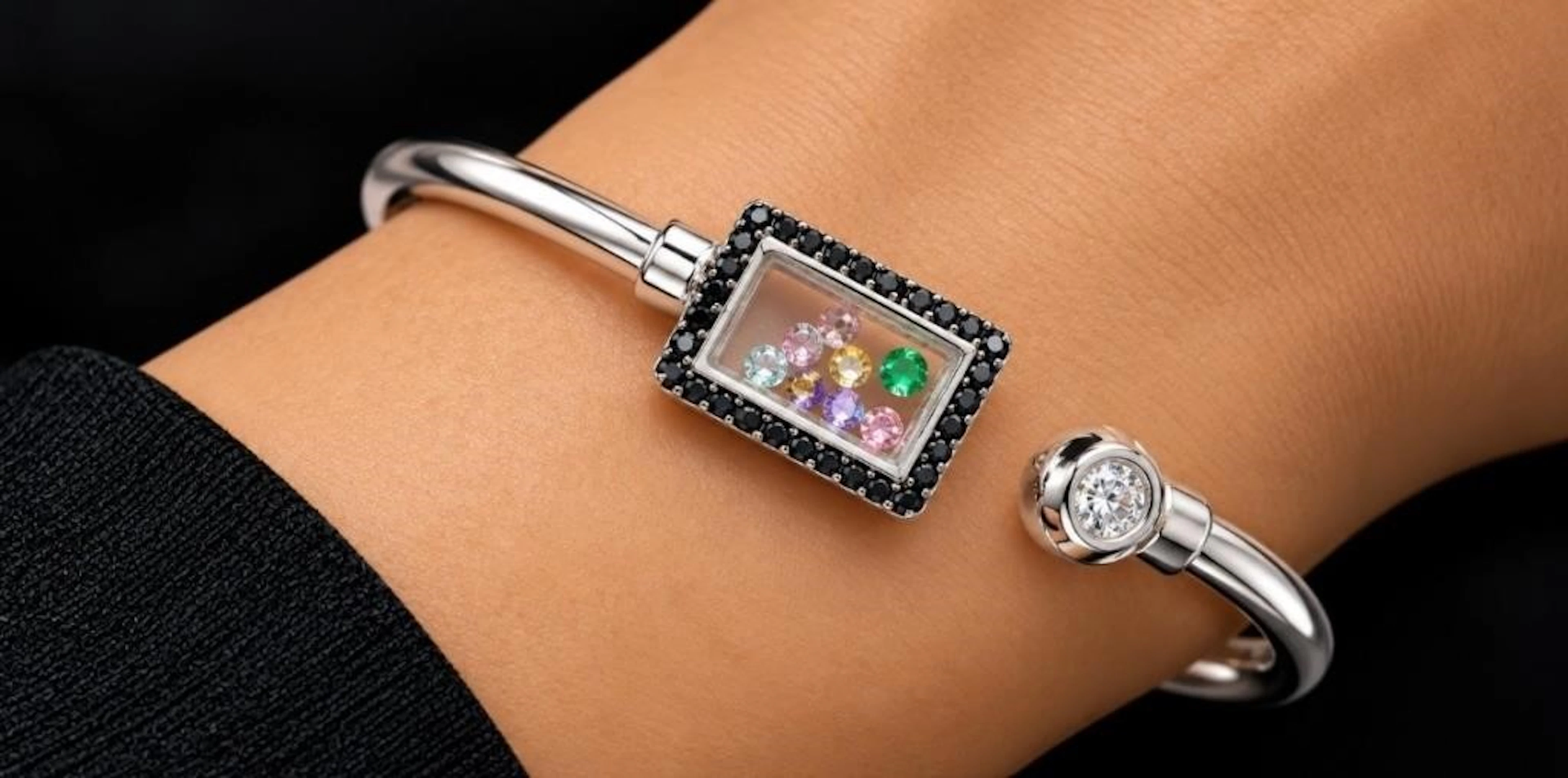 $400, silver(6.8g), dancing CZbangle, retail value