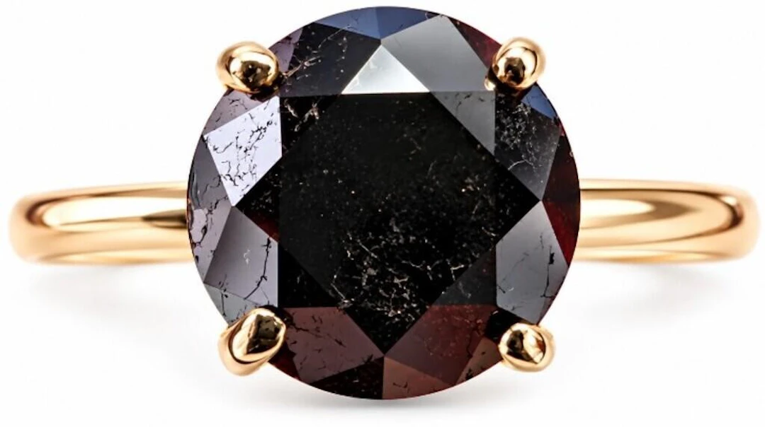$2000, 10k(1.42g), black diamond (0.6ct)ring, size