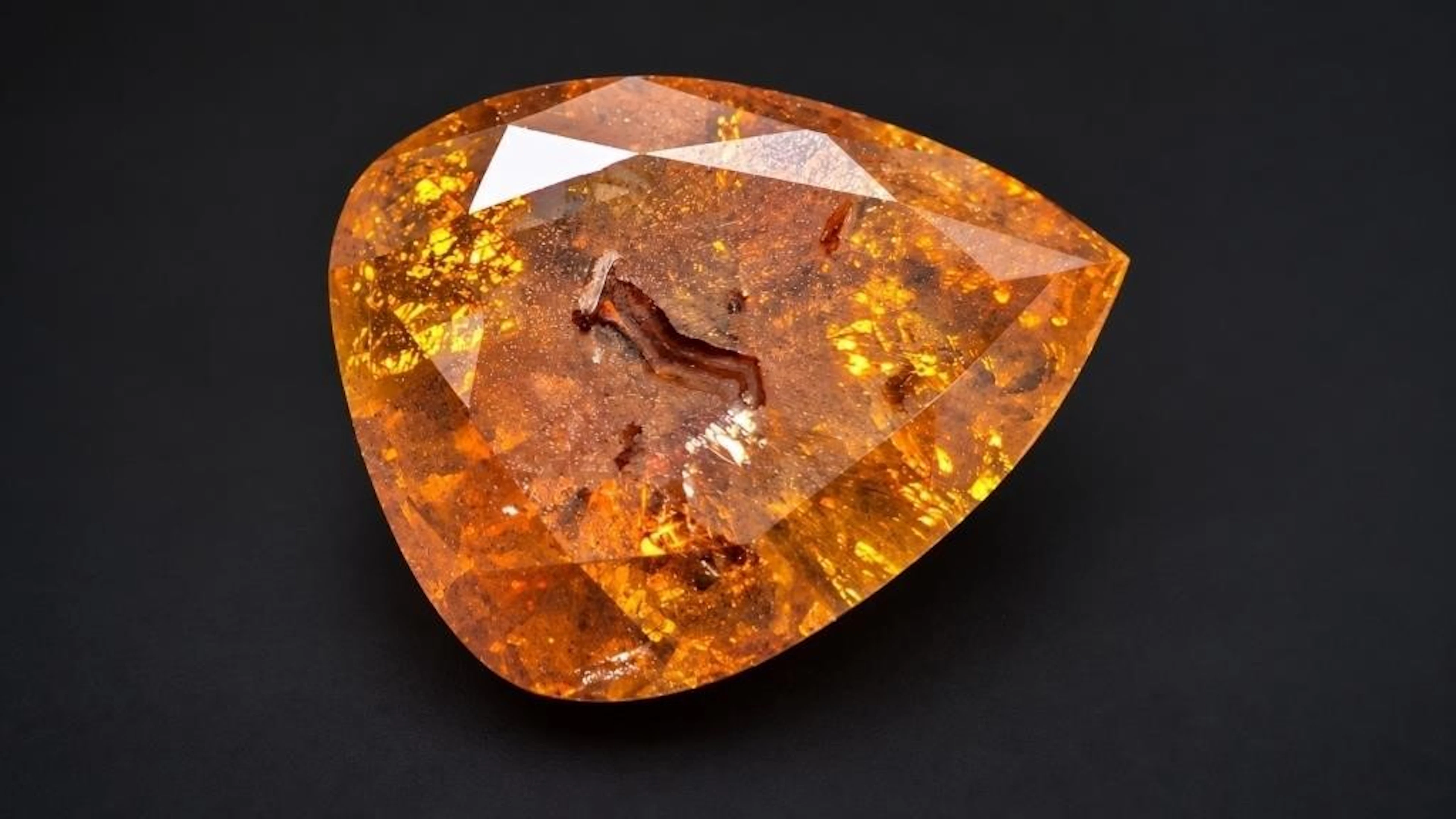$8000, Natural orange color diamond (0.85ct)gemsto